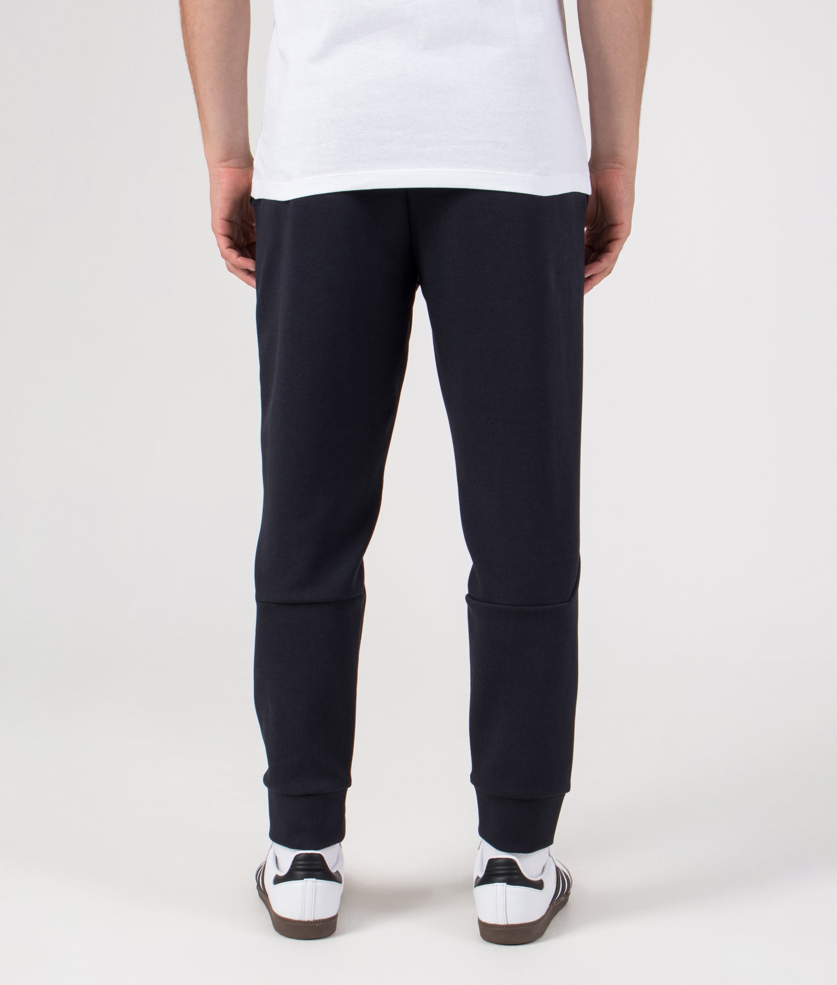 Regular Fit Zone Track Pants in Dark Blue | BOSS | EQVVS | Back model shot