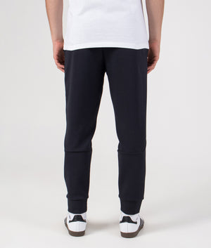 Regular Fit Zone Track Pants in Dark Blue | BOSS | EQVVS | Back model shot