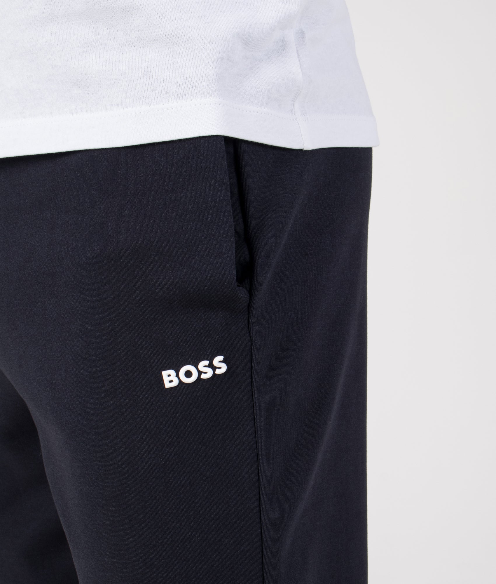 Regular Fit Zone Track Pants in Dark Blue | BOSS | EQVVS | Front detail model shot
