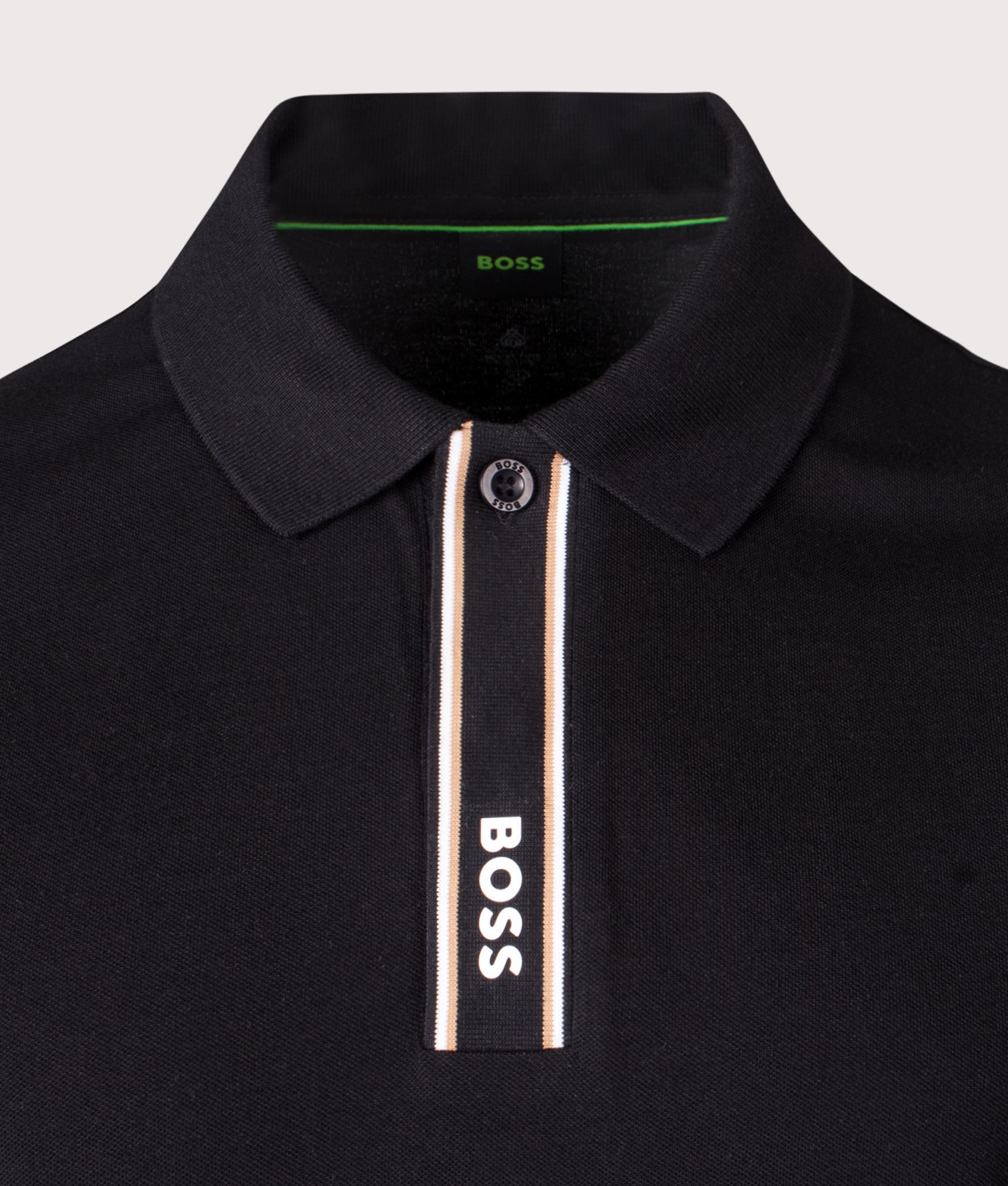 BOSS Paddy Polo shirt in Black at EQVVS Menswear. Detail shot.