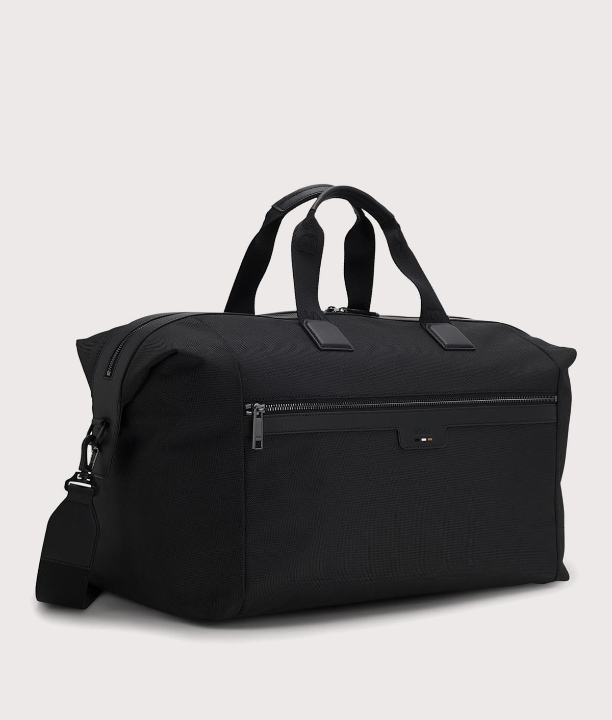 BOSS Ray Soft Holdall Bag in Black at EQVVS Menswear. Angled front shot.