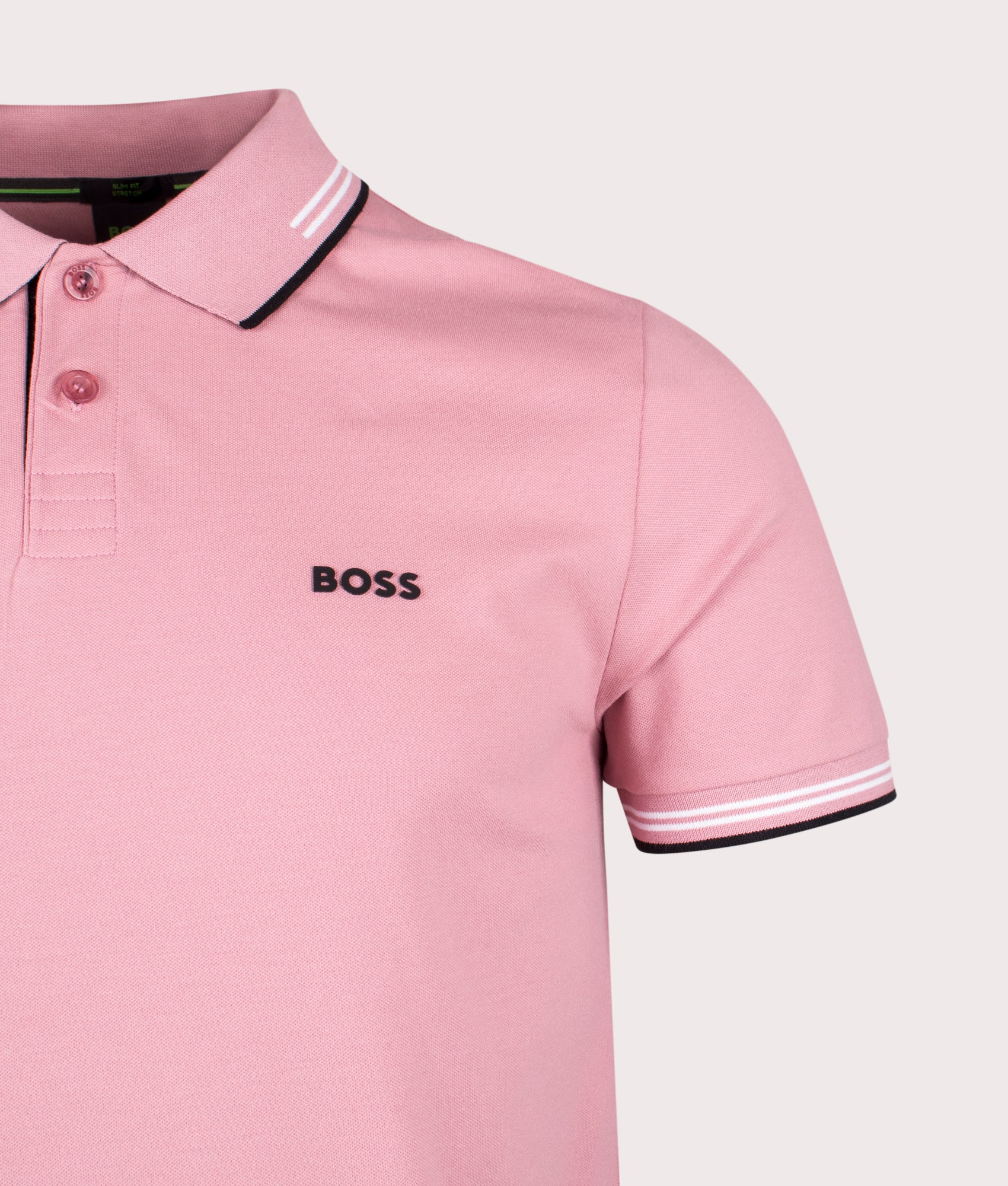 Slim Fit Paul Polo Shirt by BOSS in Open Pink. Shot by EQVVS. Detail shot.