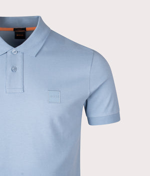 Passenger Polo Shirt in Light Blue | BOSS | EQVVS | Front detail shot 