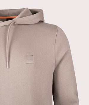 Wetalk Hoodie in Open Green. 100% Cotton | BOSS | Shot at EQVVS | Front detail shot 