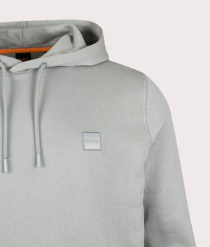Wetalk Hoodie in Open Green. 100% Cotton | BOSS | Shot at EQVVS | Front detail shot 