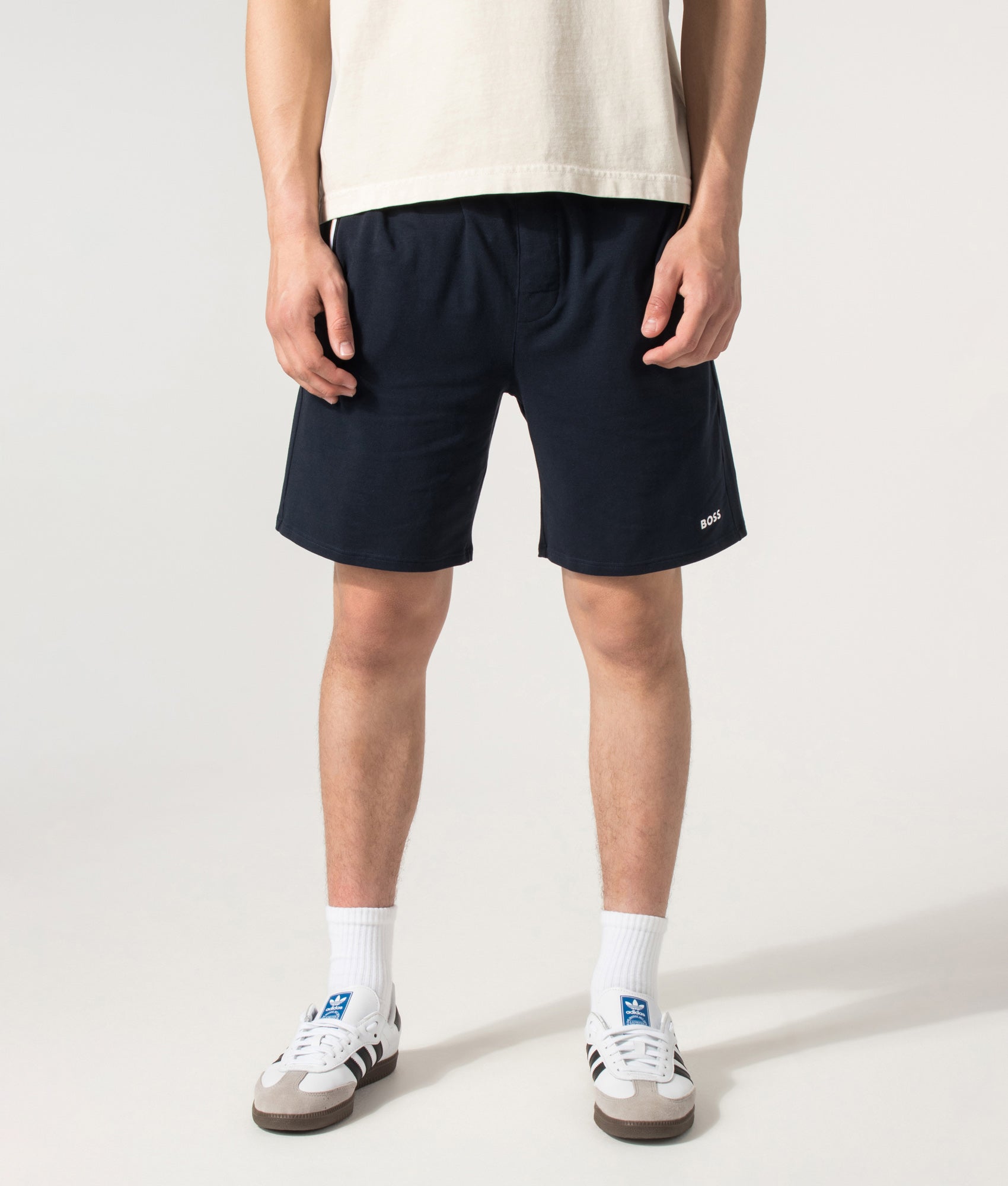 BOSS Unique Lounge Shorts in Dark Blue at EQVVS Menswear. Model front shot.