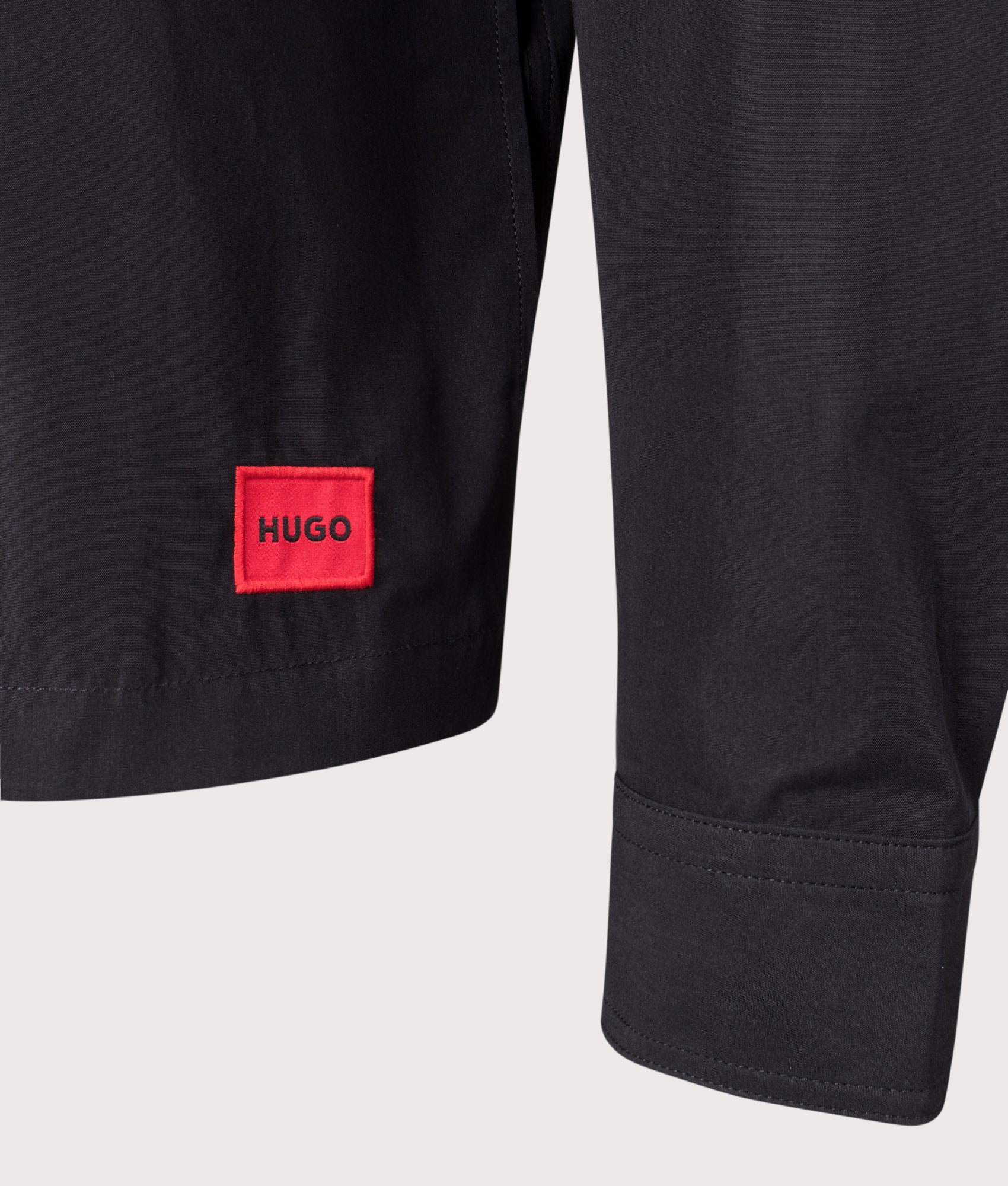 Oversized Zip Through Evalom Shirt in Black | HUGO | EQVVS | Hem detail shot 