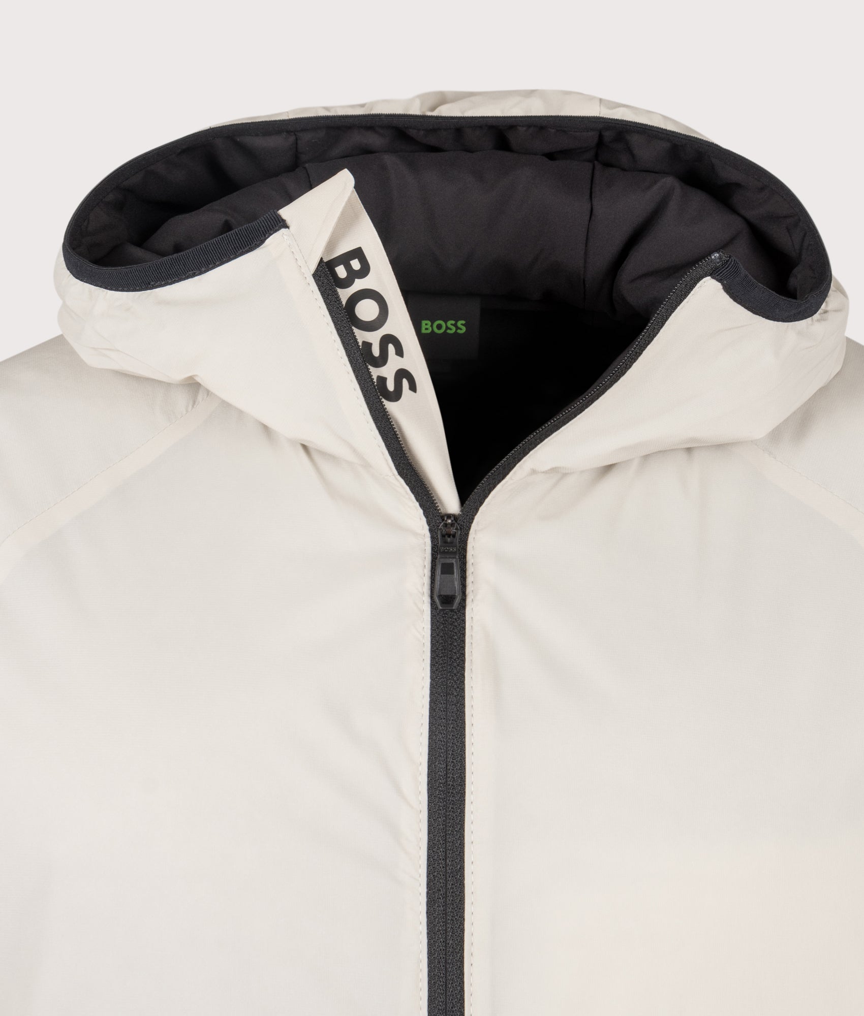 BOSS Lite X Hooded Jacket in Light Beige at EQVVS Menswear. Second detail shot.