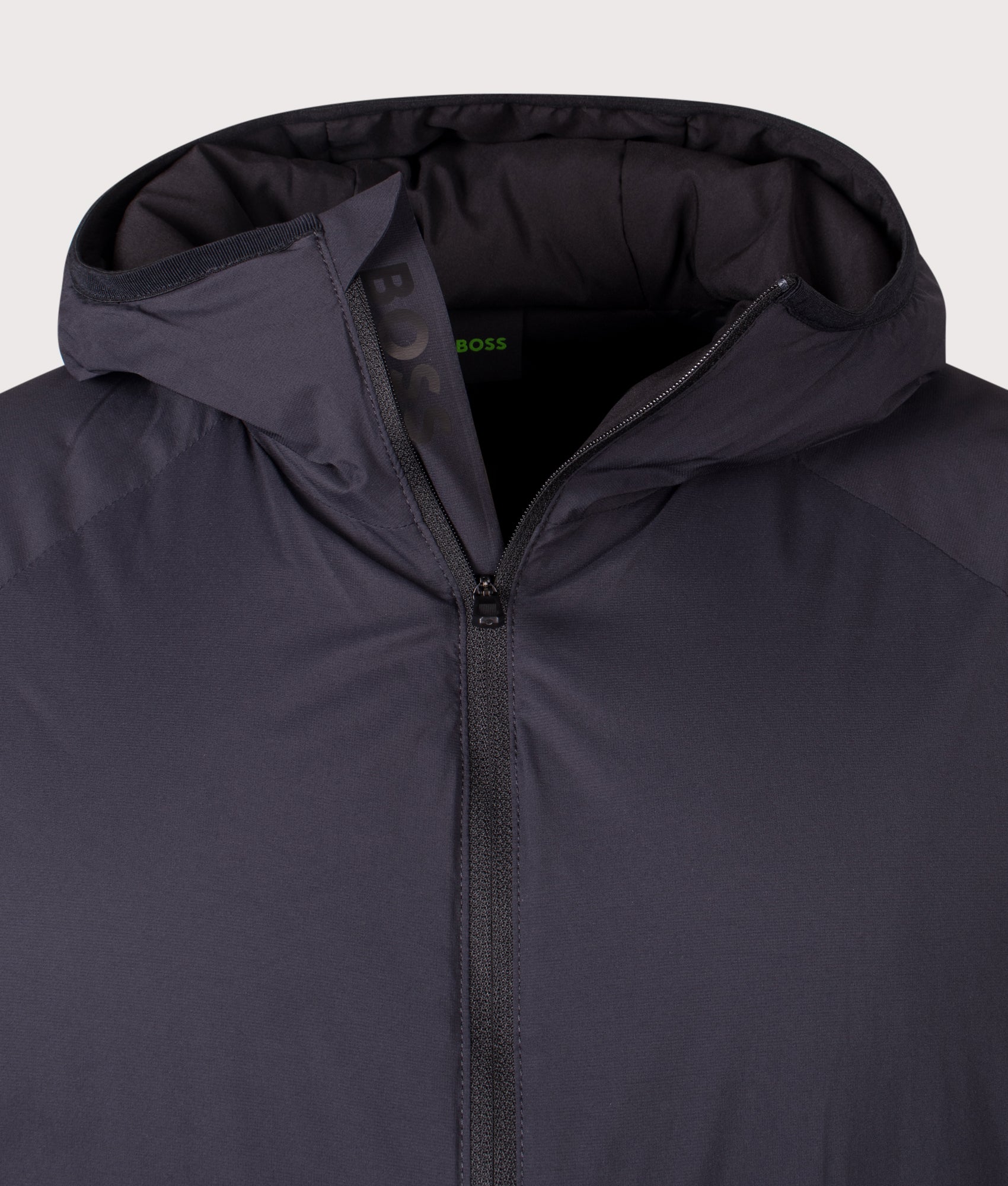 BOSS Lite X Hooded Jacket in Dark Blue at EQVVS Menswear. Second detail shot.