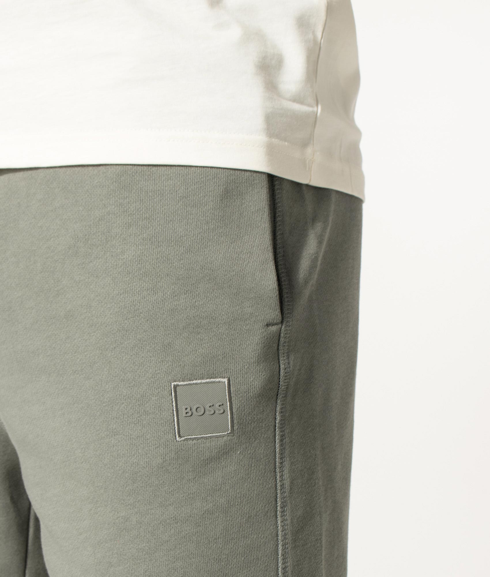 BOSS Sewalk Sweat Shorts in Open Grey at EQVVS Menswear. Detail shot.