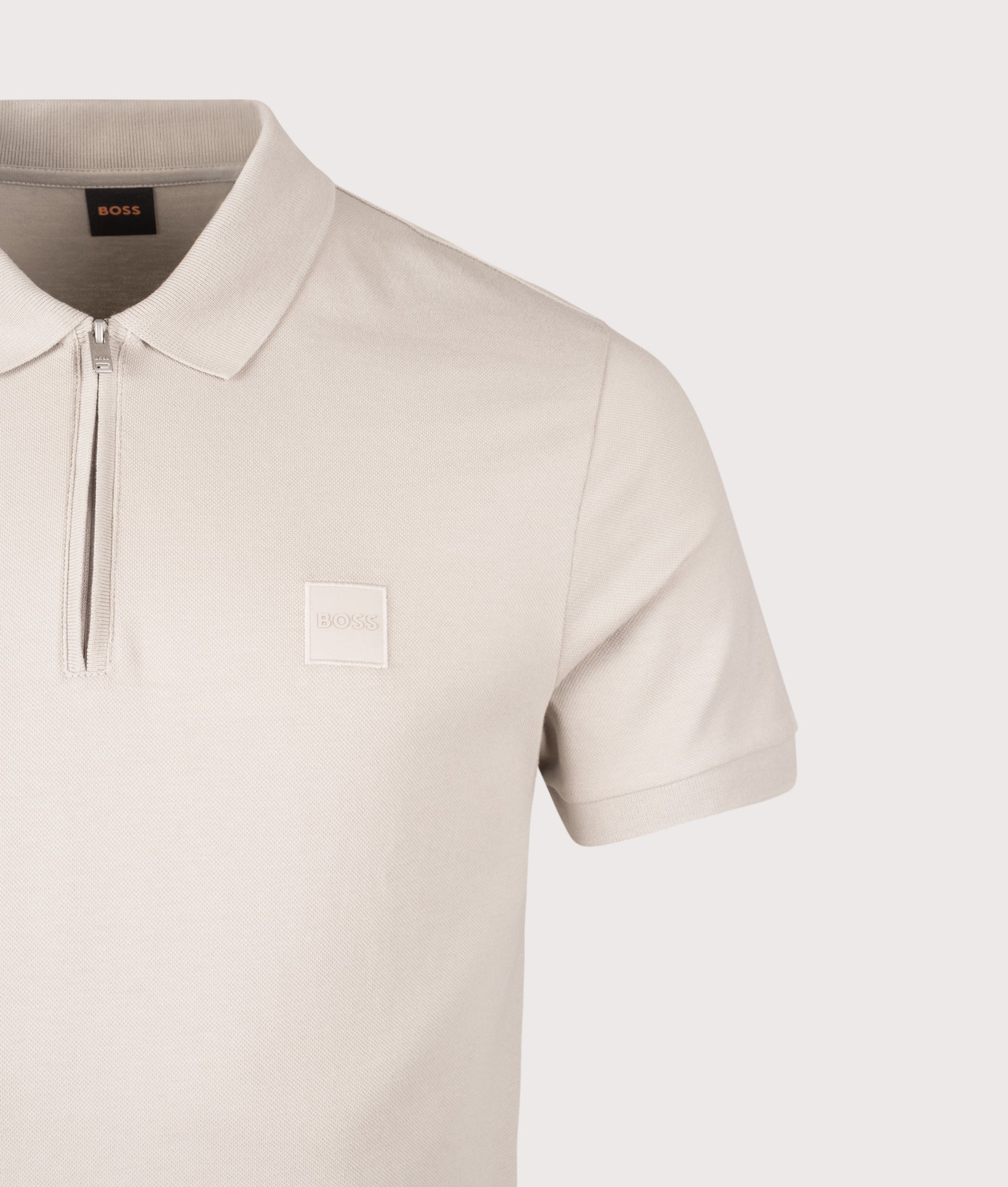 Boss Slim Fit Passerzip Polo Shirt in Open Grey at EQVVS Menswear. Detail shot.