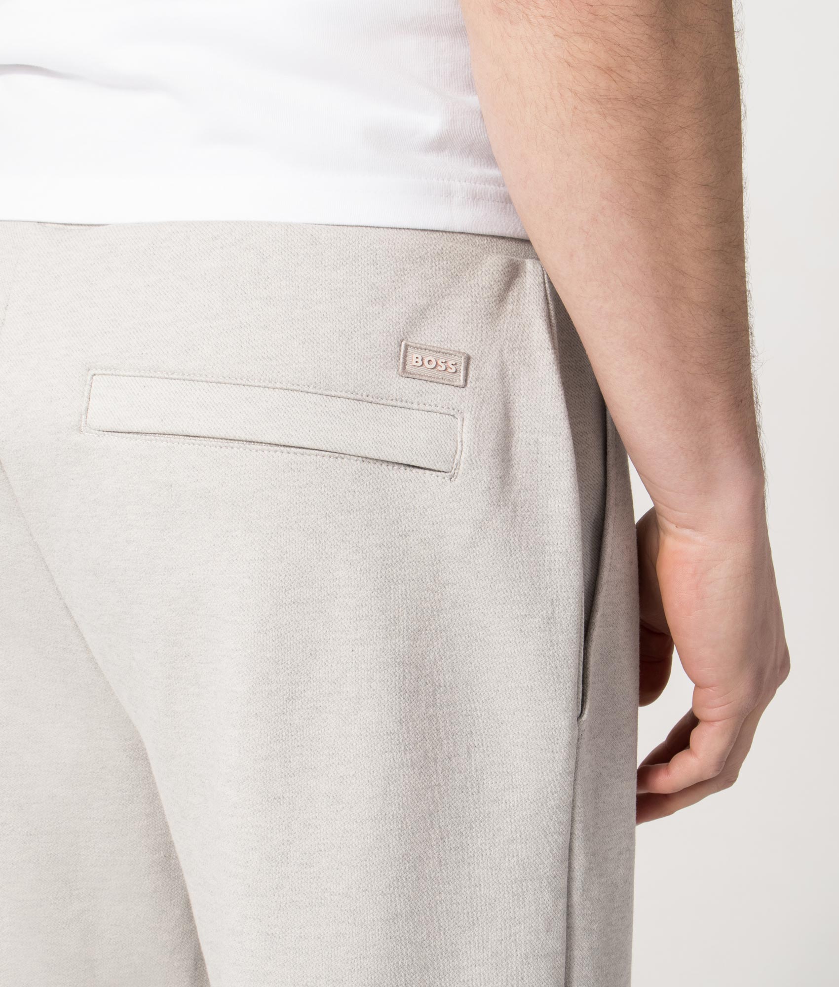 Relaxed Fit Twist Pleated Pants in Open Grey | BOSS | EQVVS | Back detail model shot 