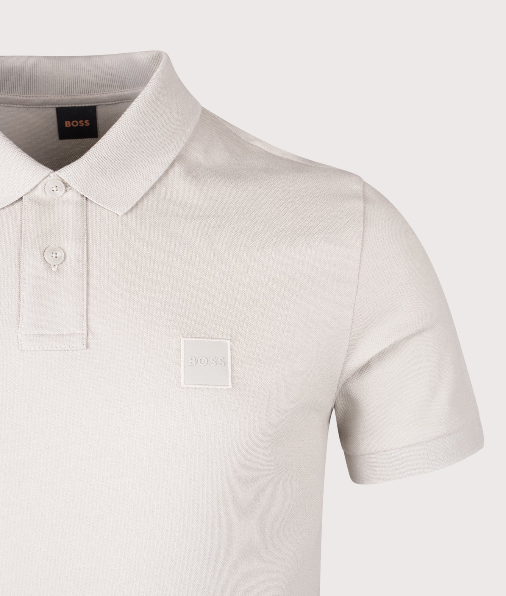 BOSS Slim Fit Passenger Polo Shirt in Open Grey at EQVVS Menswear. Detail shot.