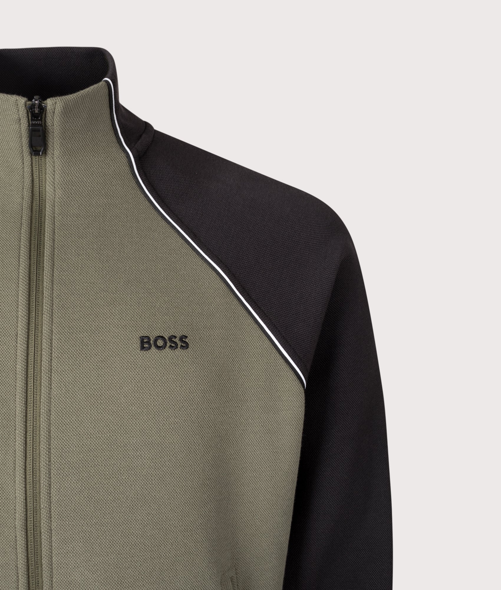 BOSS Join Skaz Zip Through Track Top in Dark Beige at EQVVS Menswear. Detail shot.
