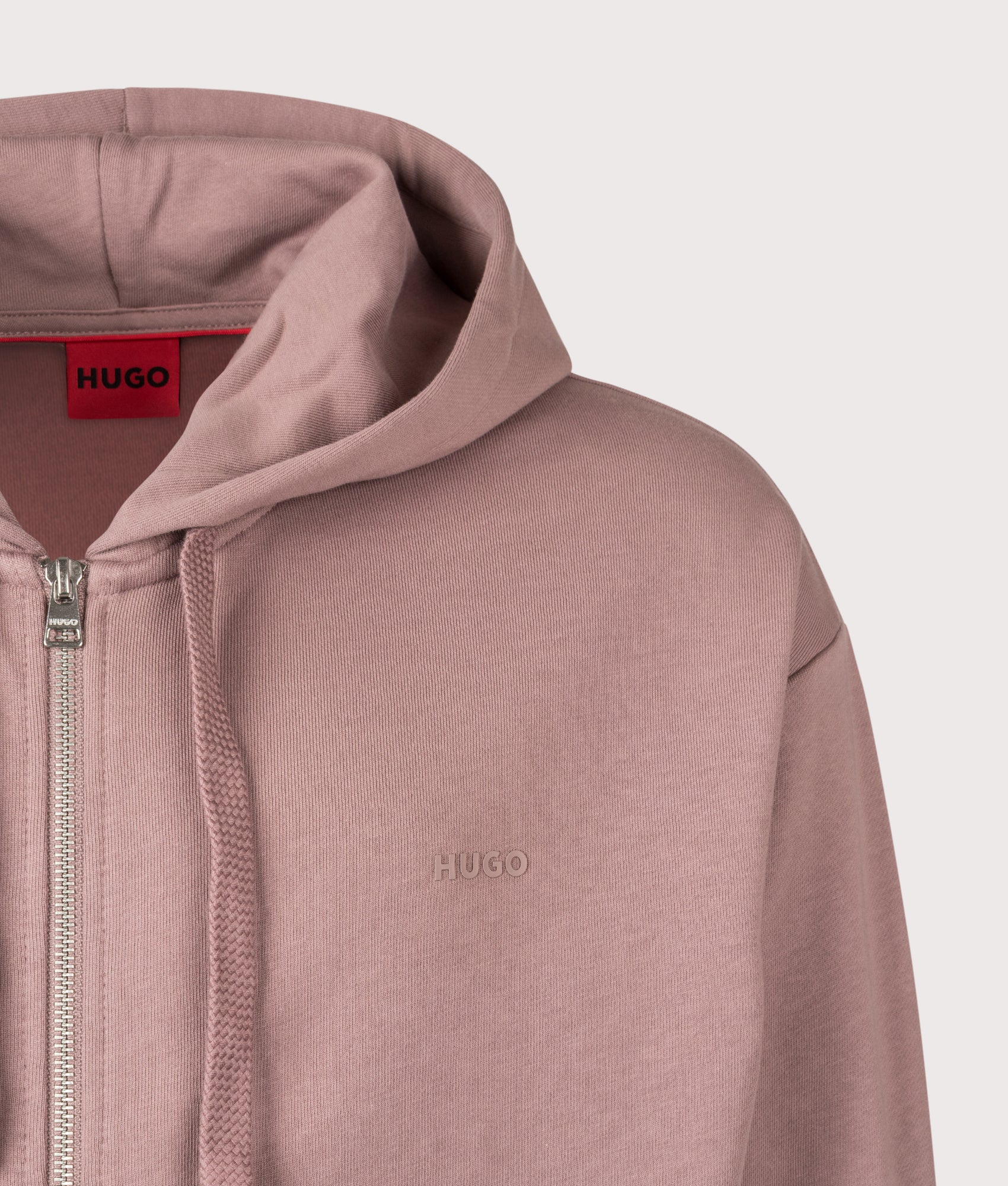 HUGO Relaxed Fit Dapozip Hoodie in Light and Pastel Brown at EQVVS Menswear. Detail shot.