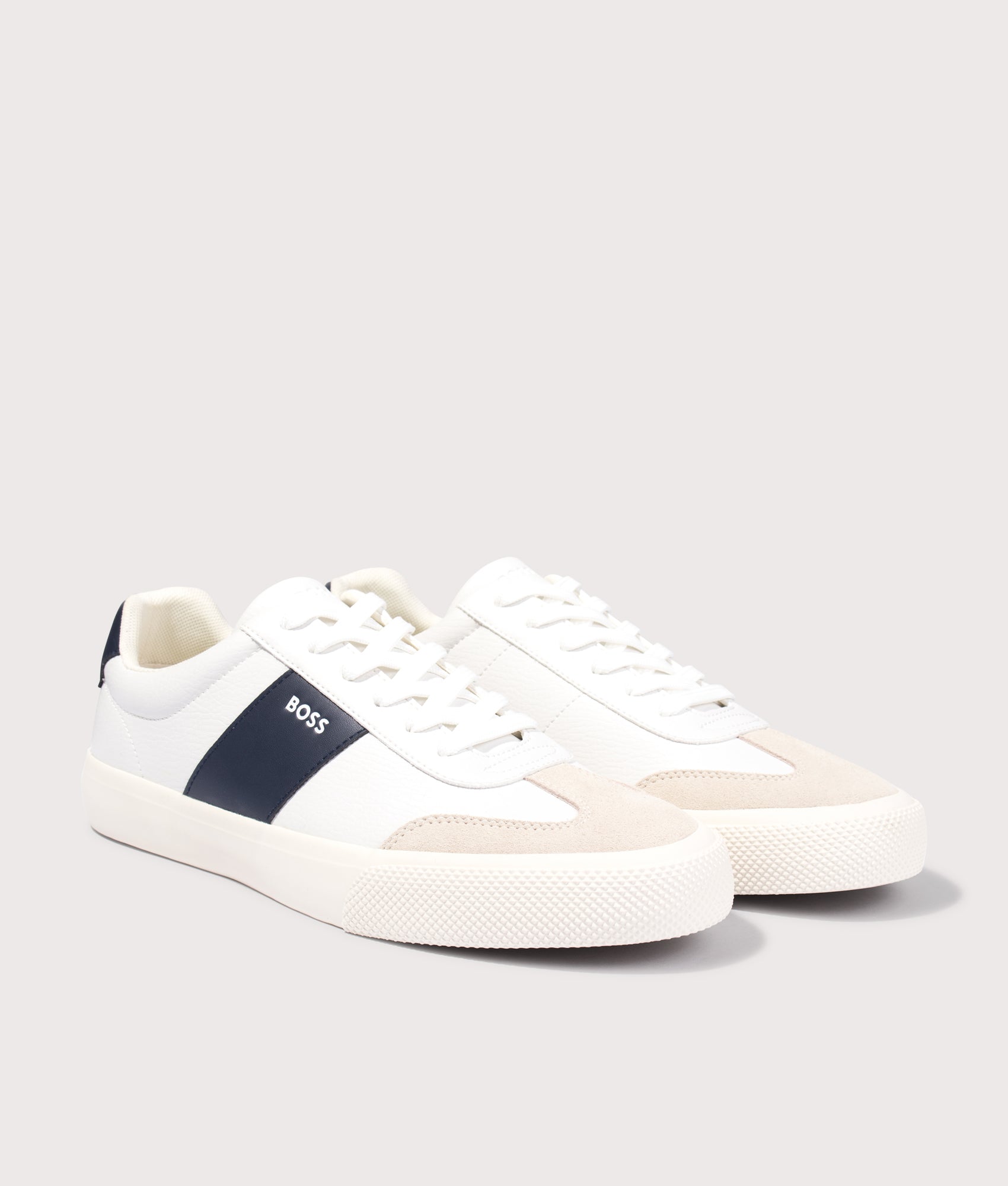 Aiden Tenn Trainers in Open White by BOSS. Shot by EQVVS. Front angled shot.