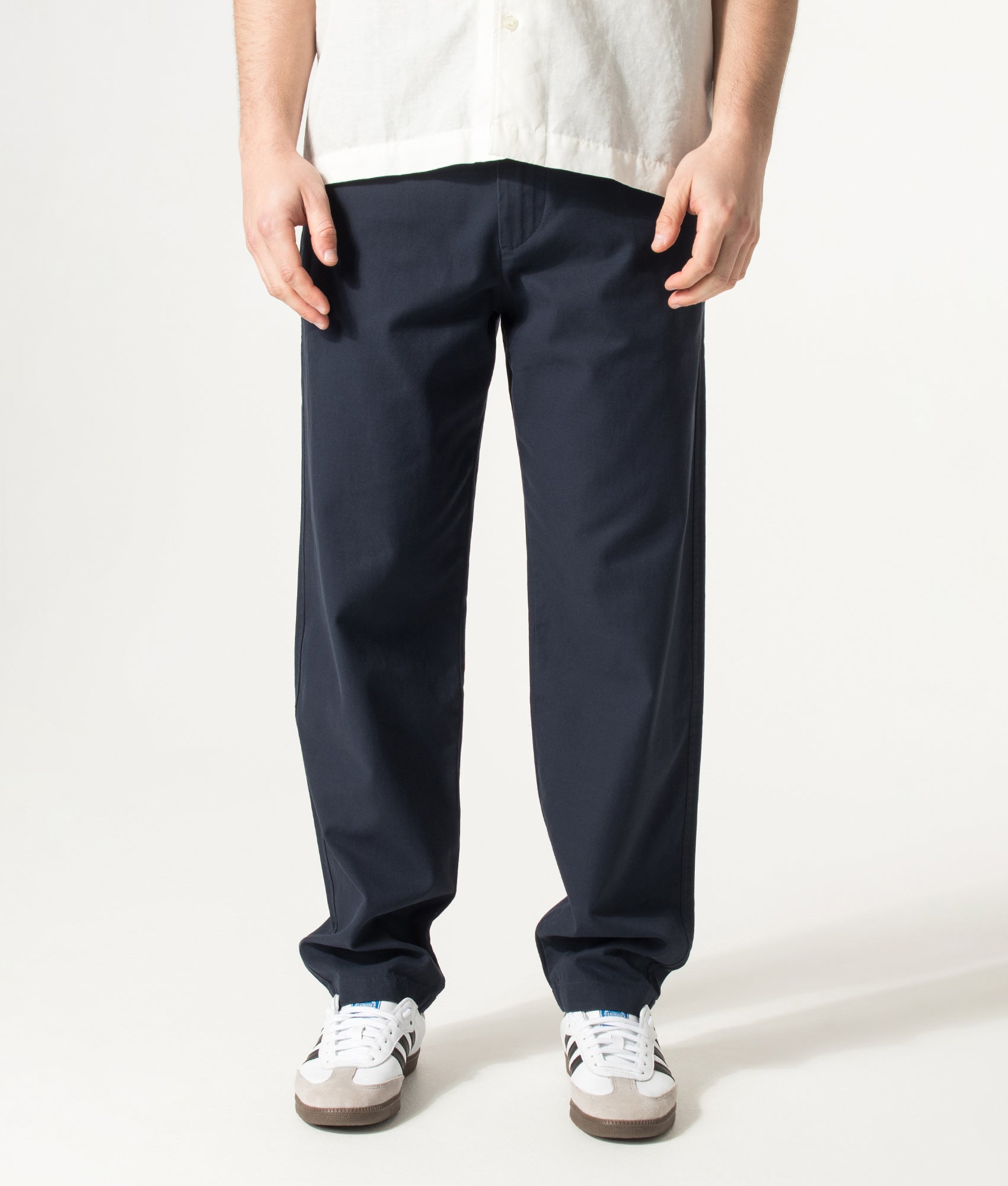 Chinos in Dark Blue by BOSS. Shot by EQVVS. Front shot.