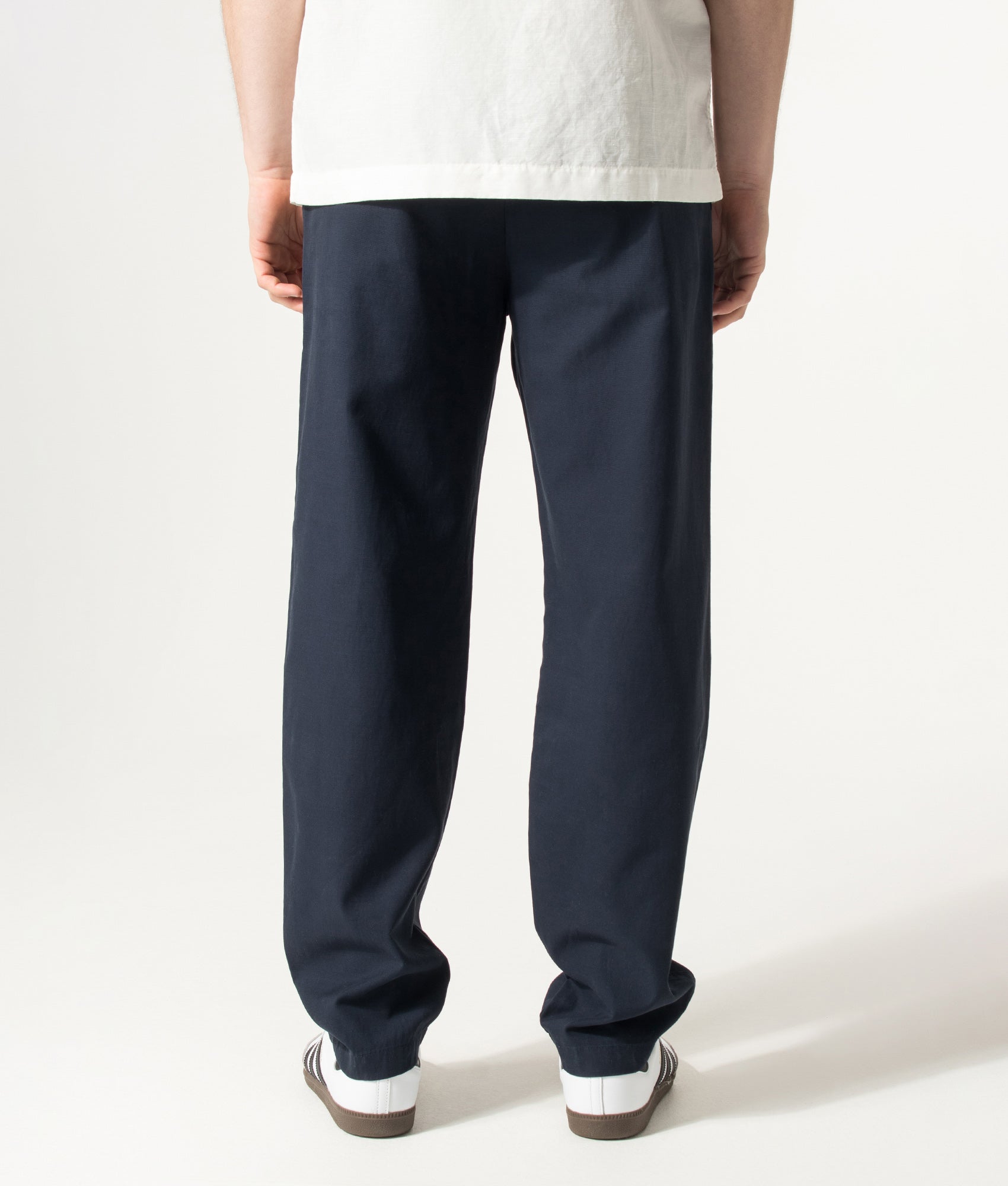 Chinos in Dark Blue by BOSS. Shot by EQVVS. Back shot.