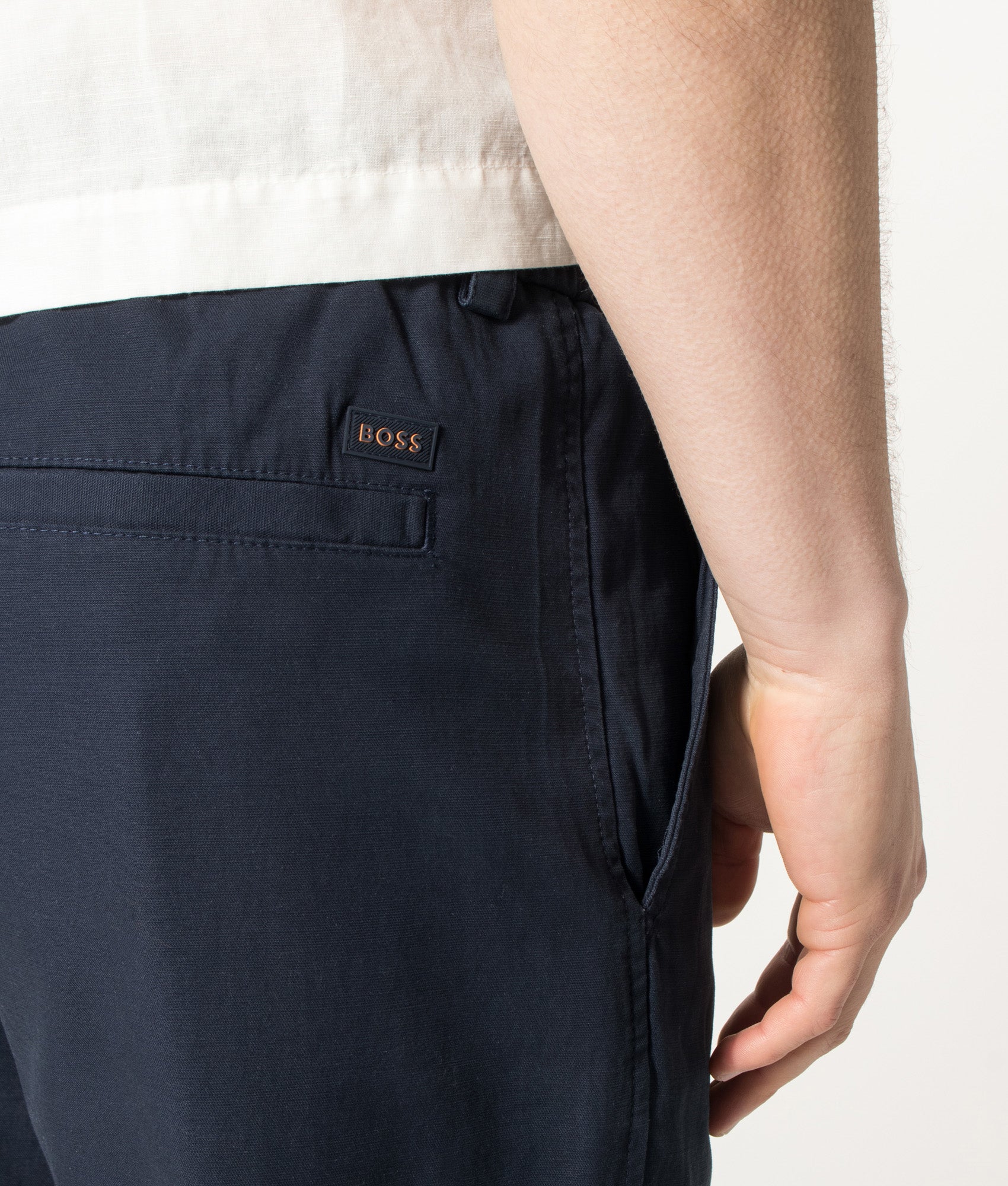 Chinos in Dark Blue by BOSS. Shot by EQVVS. Detail shot.