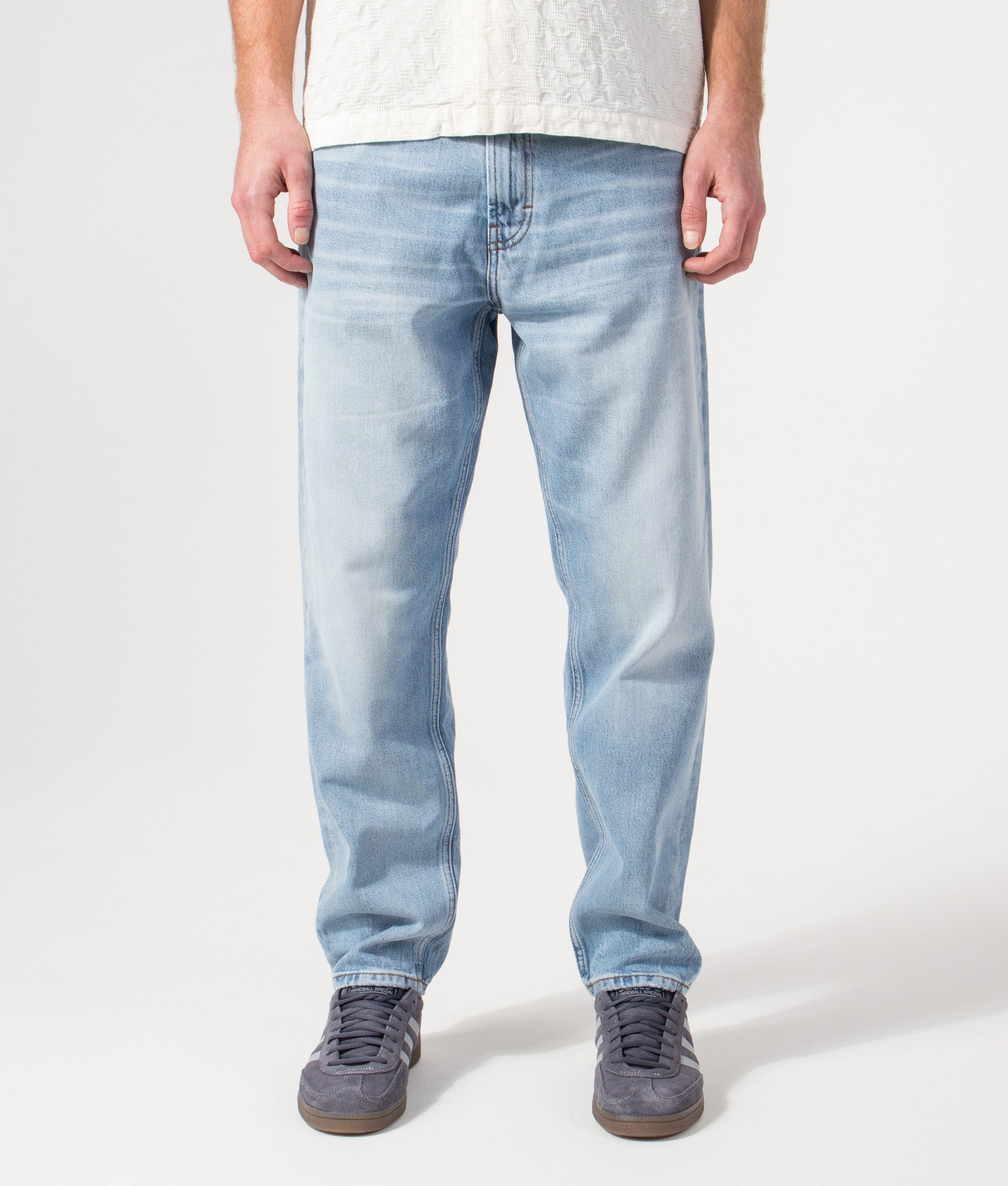 Regular Fit HUGO 838 Jeans in Bright Blue by HUGO. Shot by EQVVS. Front shot.