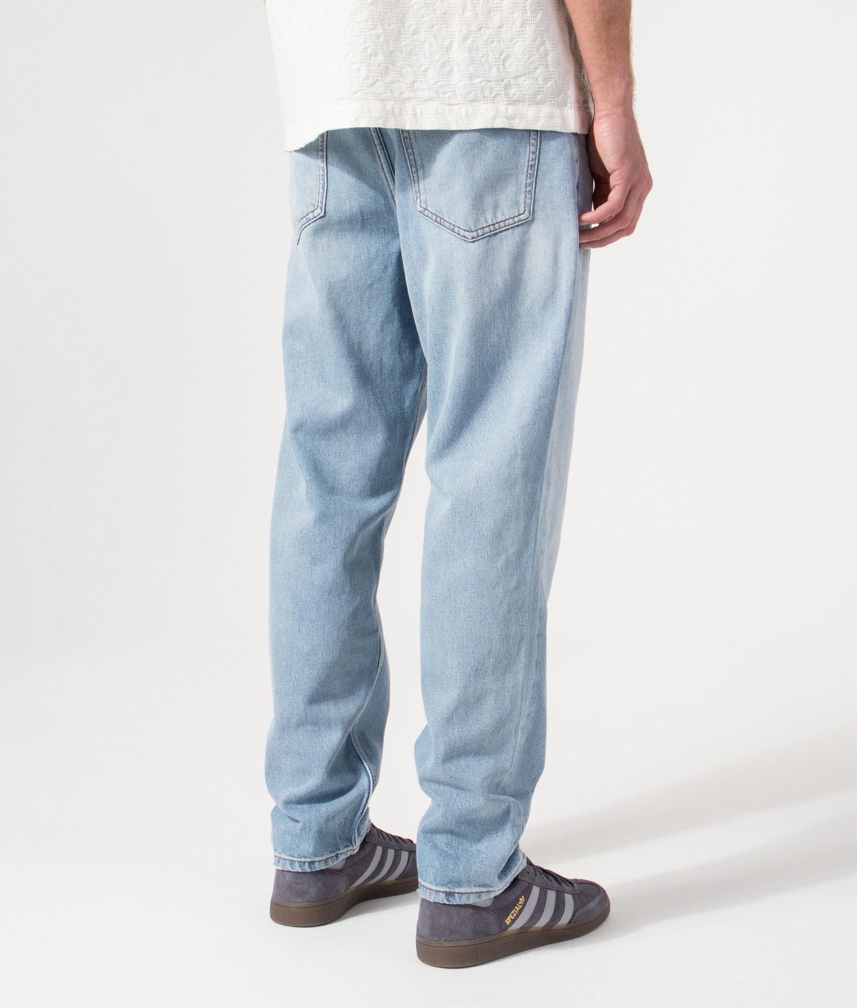 Regular Fit HUGO 838 Jeans in Bright Blue by HUGO. Shot by EQVVS. Back shot.