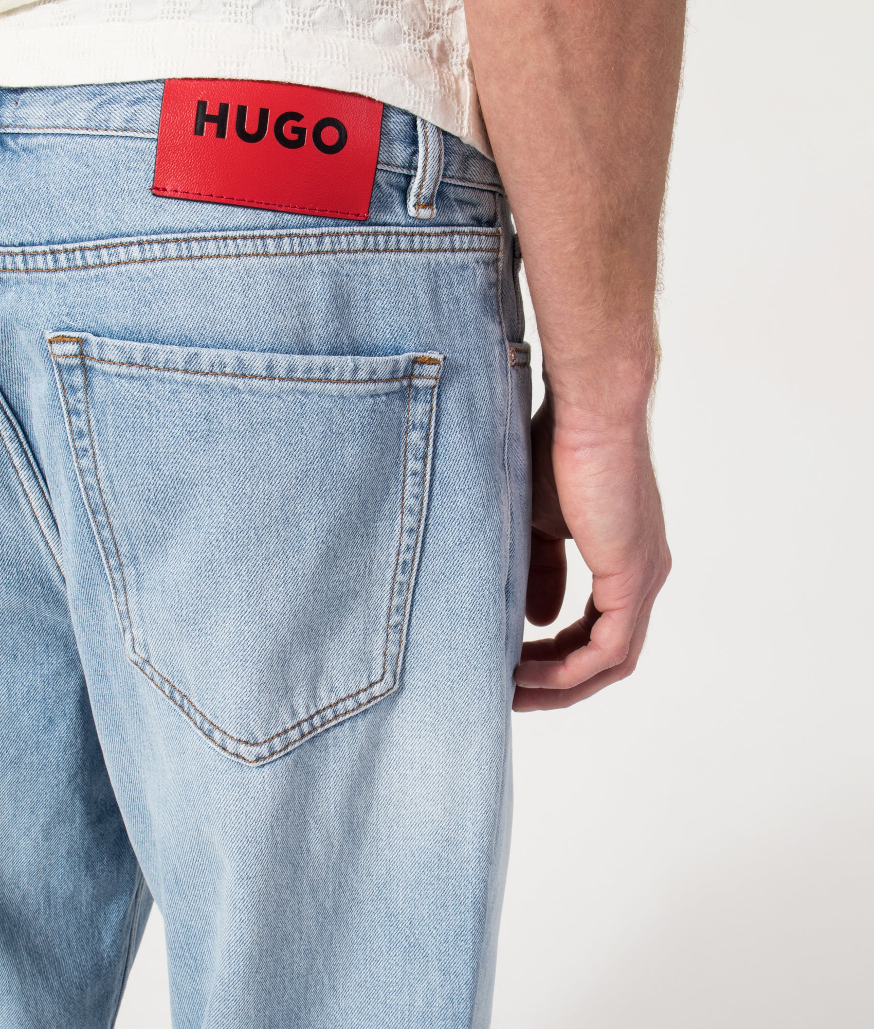 Regular Fit HUGO 838 Jeans in Bright Blue by HUGO. Shot by EQVVS. Back detail shot.