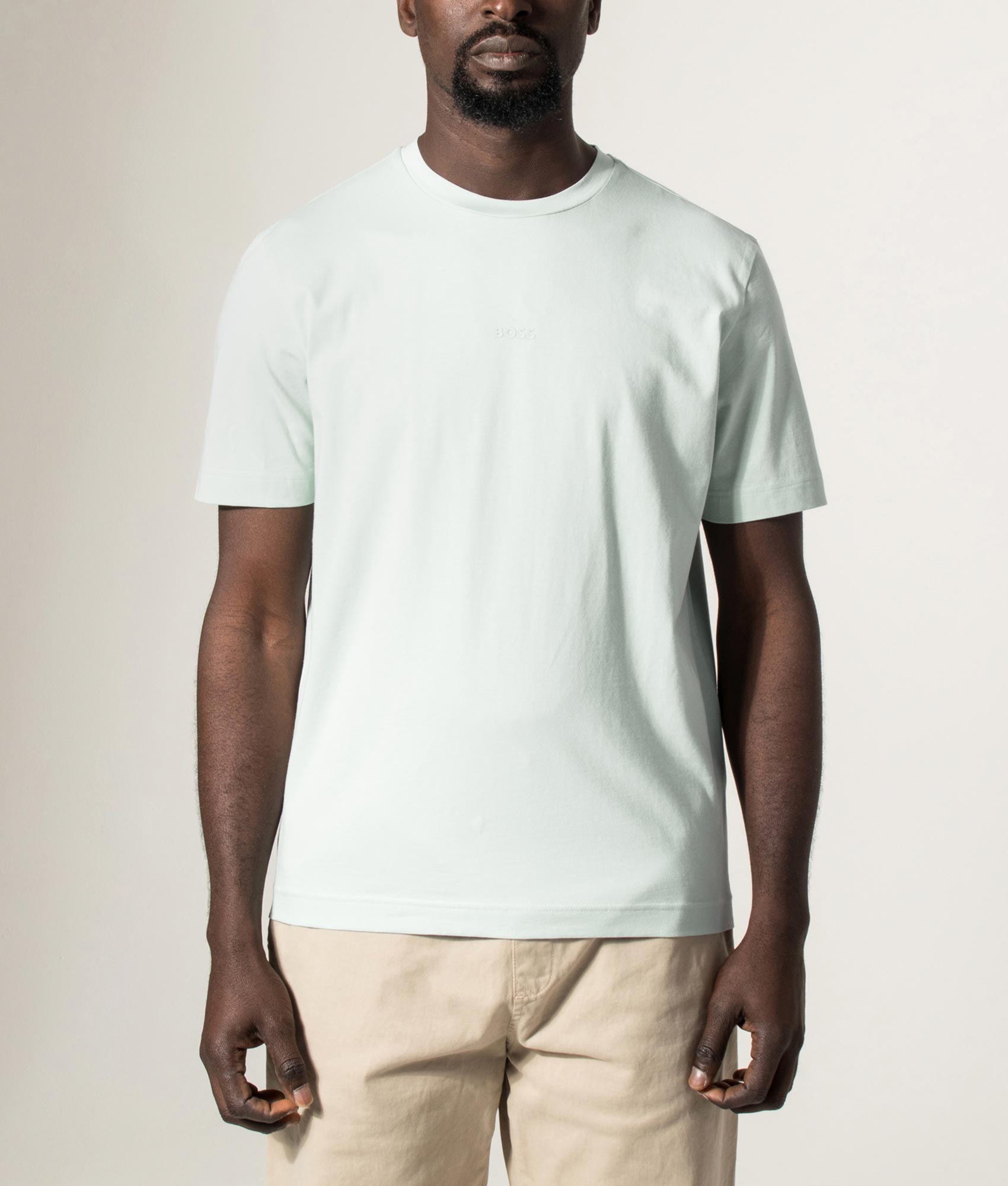 BOSS Relaxed Fit TChup T-Shirt in Turquoise/Aqua at EQVVS Menswear. Model front shot.