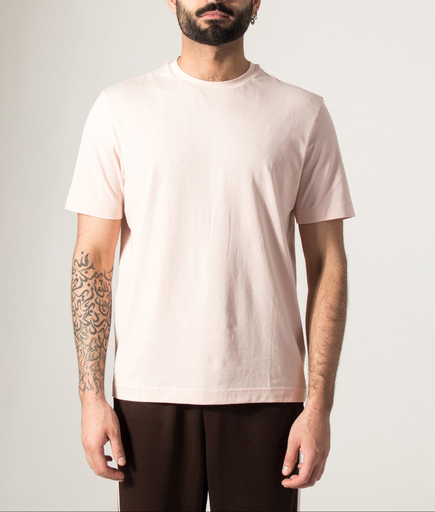 BOSS Relaxed Fit TChup T-Shirt in Open Pink at EQVVS Menswear. Model front shot.
