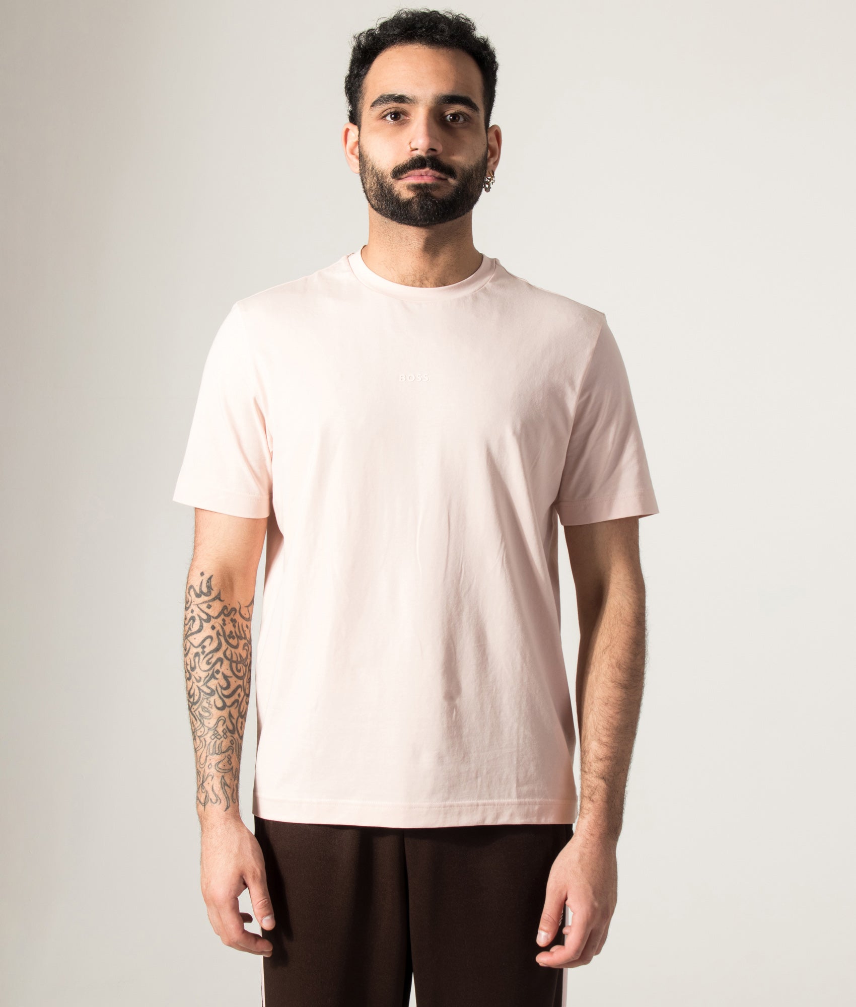BOSS Relaxed Fit TChup T-Shirt in Open Pink at EQVVS Menswear. Model front shot.