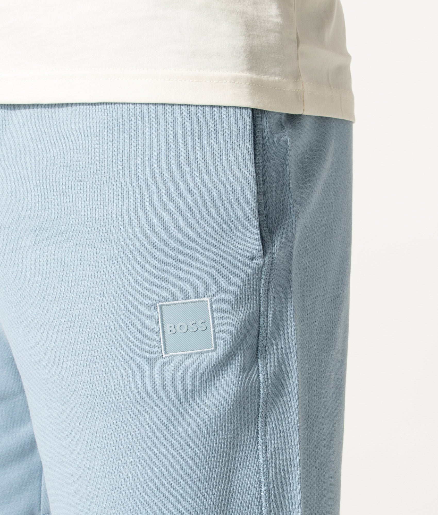 BOSS Sewalk Sweat Shorts in Light/Pastel Blue at EQVVS Menswear. Detail shot.