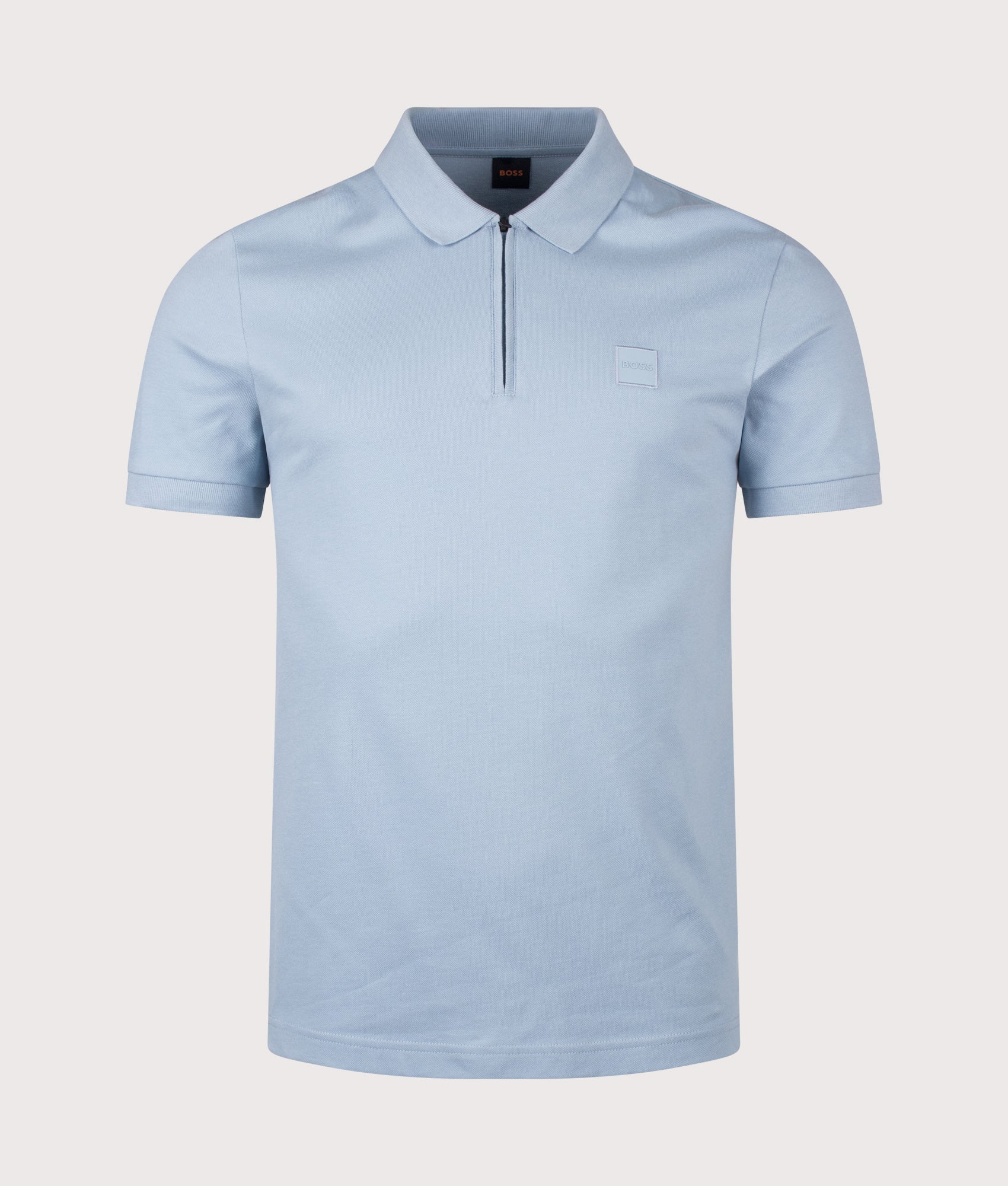 Slim Fit Passerzip Polo Shirt in Light/Pastel Blue by BOSS. Shot by EQVVS. Front shot.