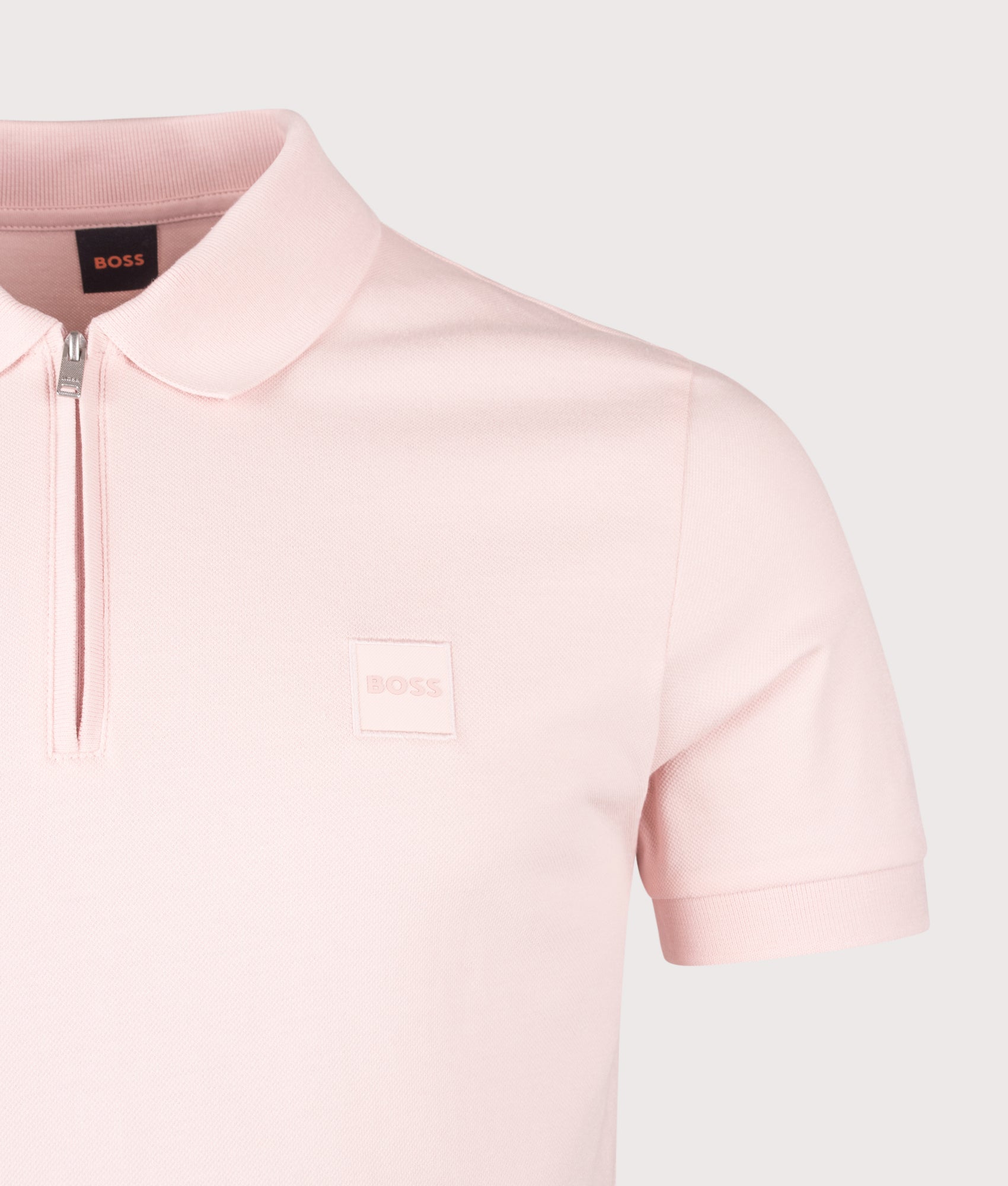 Slim Fit Passerzip Polo Shirt in Open Pink by BOSS. Shot by EQVVS. Detail Shot.