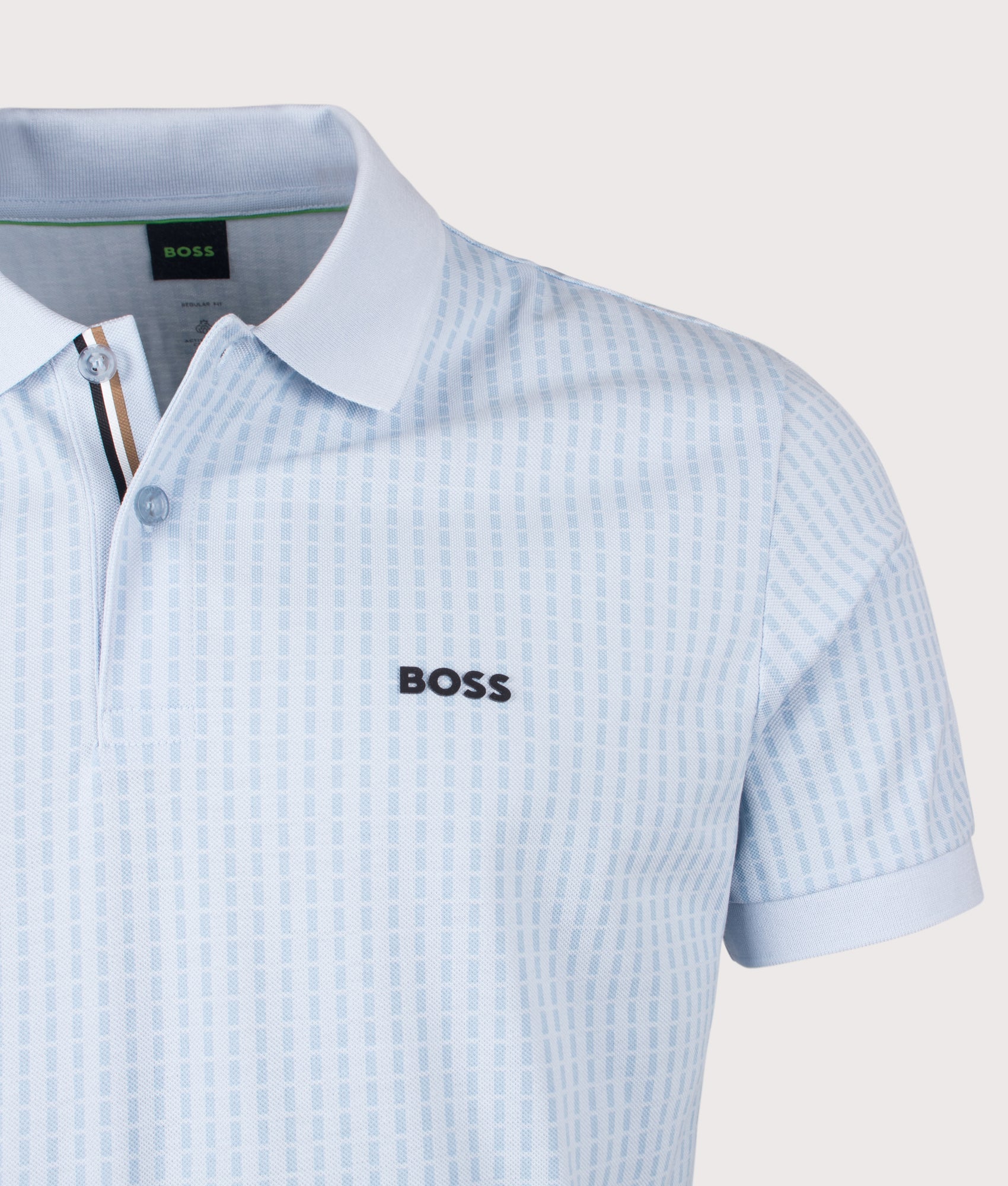 Birdie 3 Polo Shirt in Open Blue by BOSS. Shot by EQVVS. Detail shot.