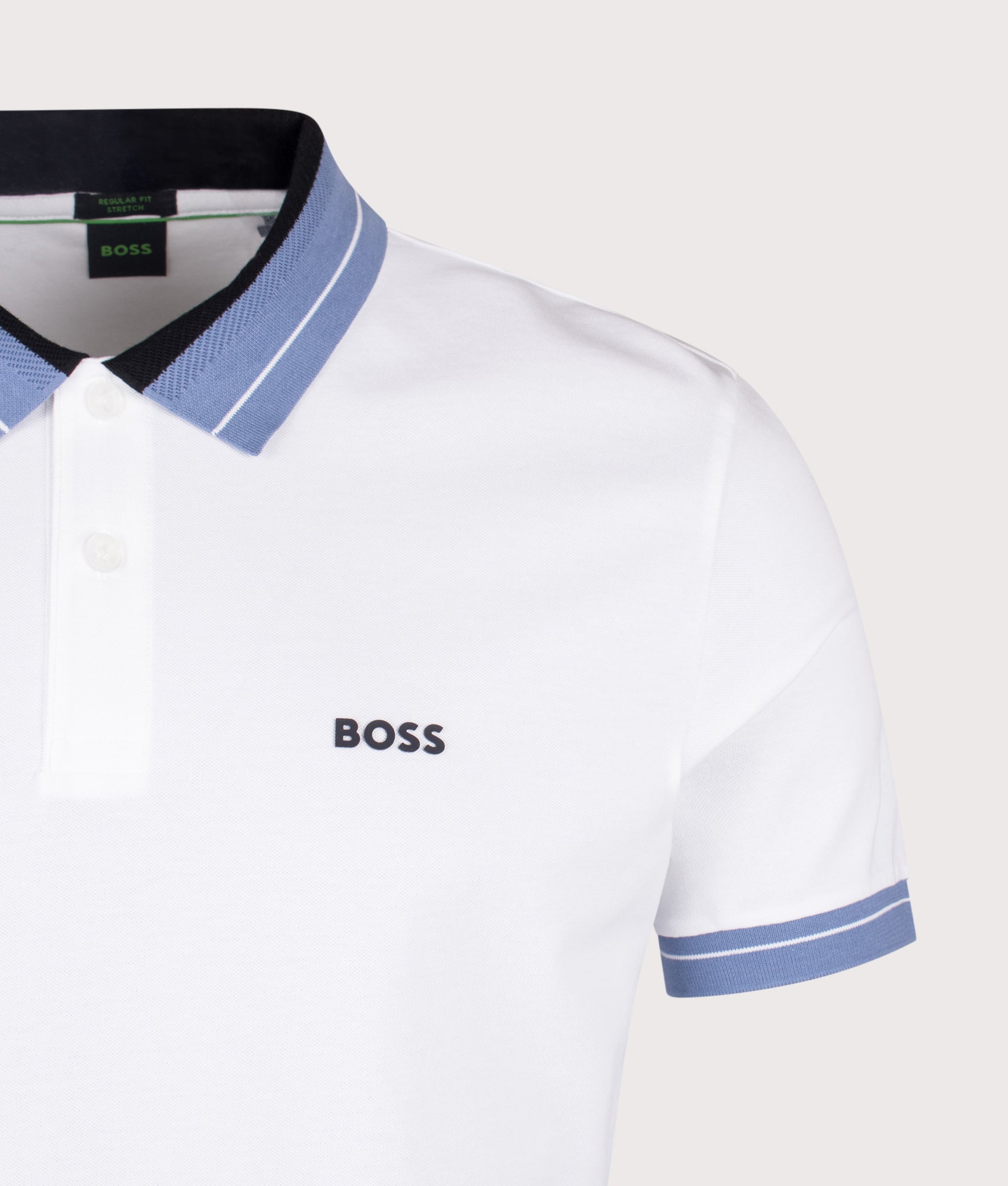 Member Polo Shirt in White by BOSS. Shot by EQVVS. Detail shot.