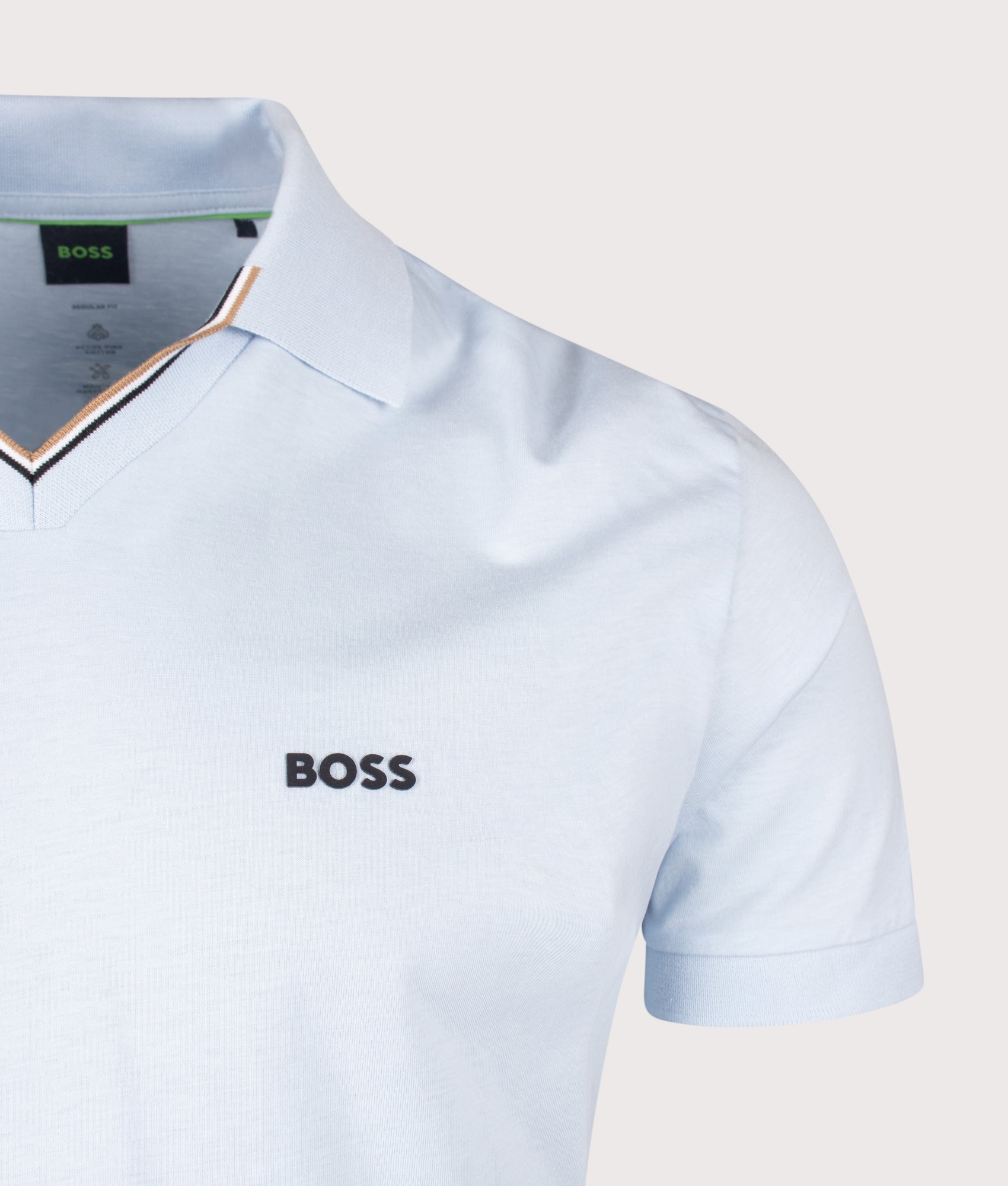 Birdie 1 Polo Shirt in Open Blue by BOSS. Shot by EQVVS. Detail shot.