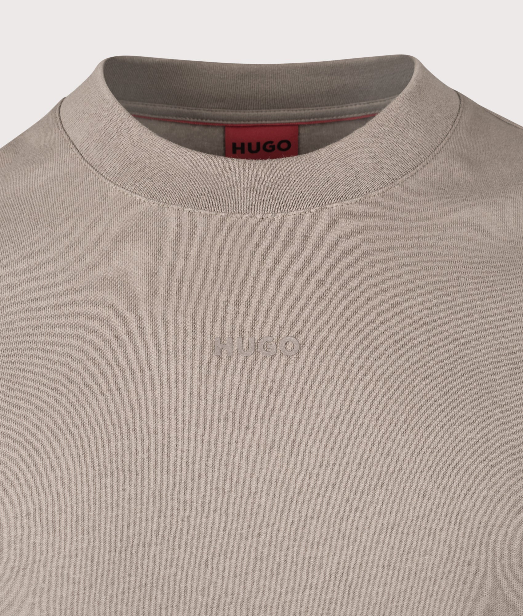HUGO Relaxed Fit Dapolino T-Shirt in Light/Pastel Brown at EQVVS Menswear. Detail shot.