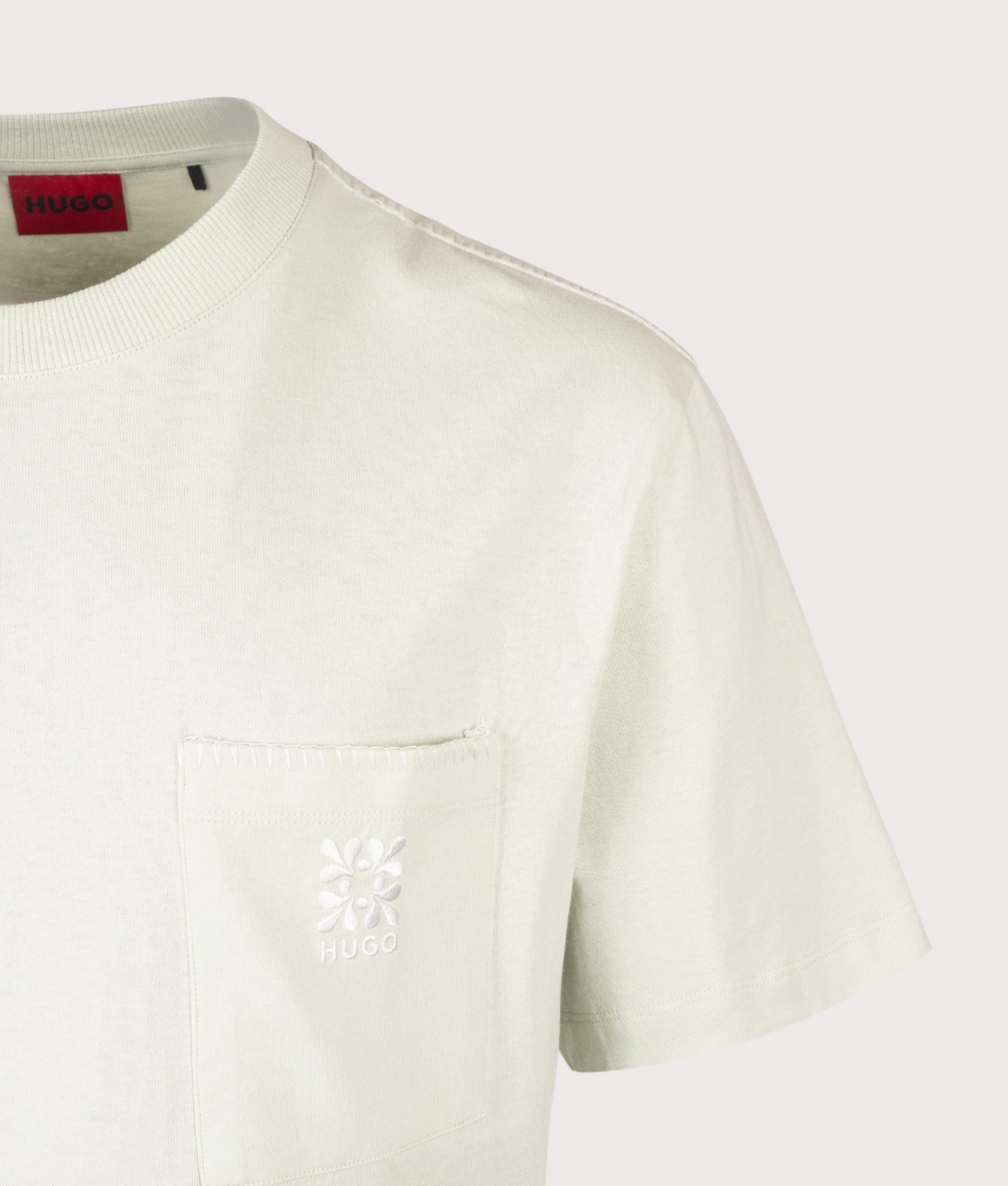 Relxed Fit Darro T-Shirt in Light Pastel Green by HUGO. Shot by EQVVS. Detail shot.