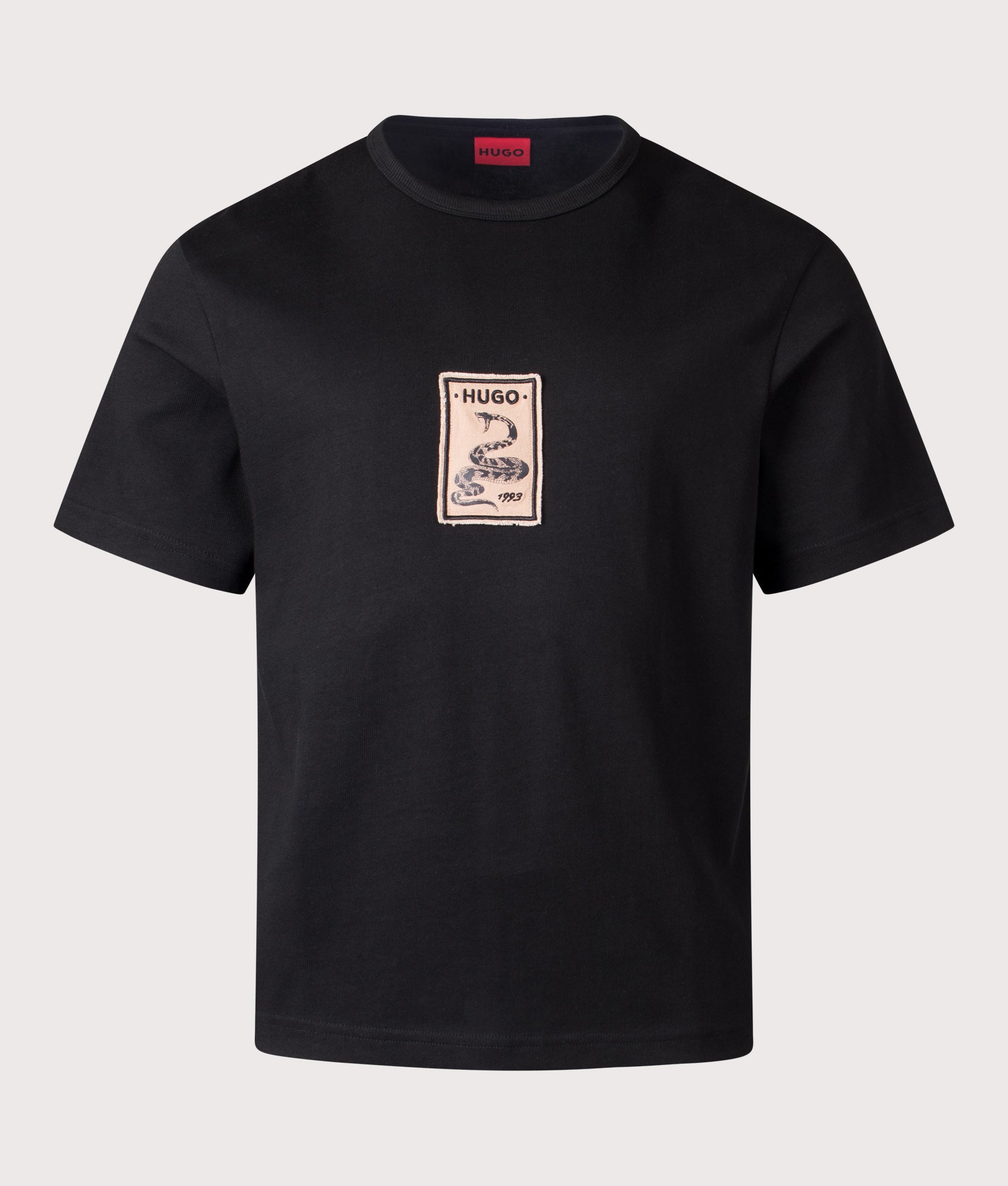 HUGO Oversized Draxon T-Shirt in Black at EQVVS Menswear. Front shot.