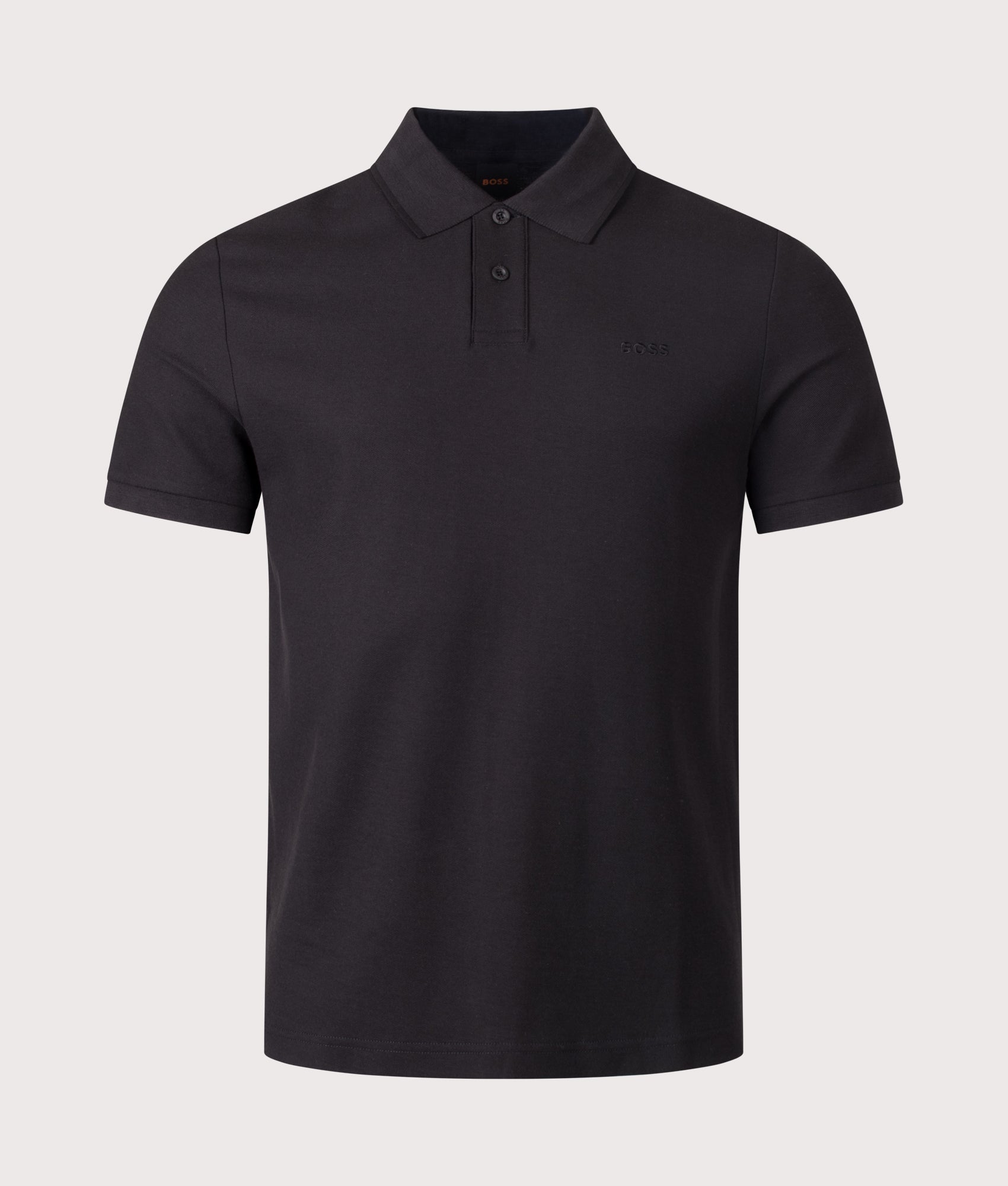 BOSS Phoenix Honeycomb Polo Shirt in Black at EQVVS Menswear. Front shot.