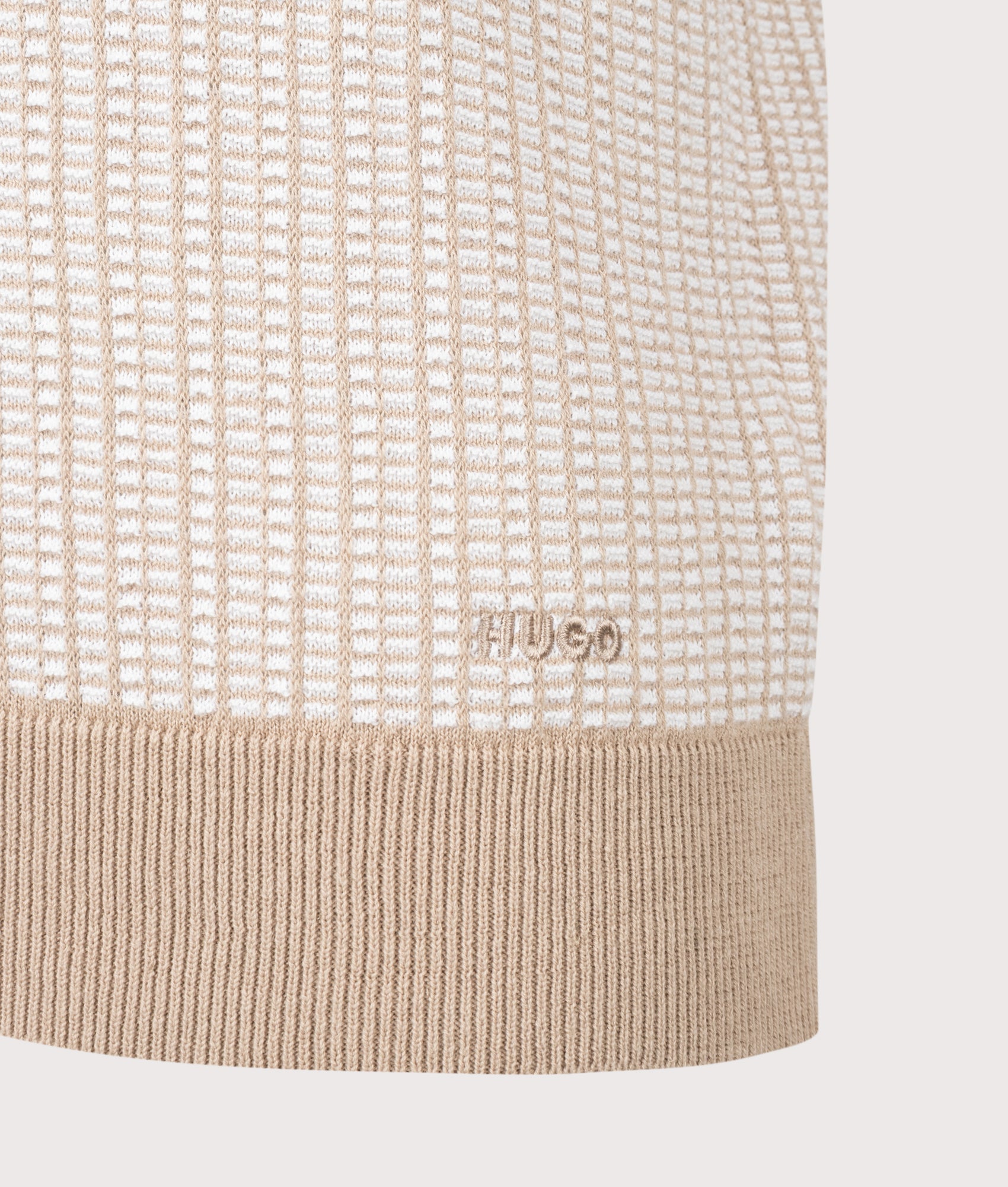 HUGO Johnny Collar Knitted Polo Shirt in Medium Beige at EQVVS Menswear. Detail shot.