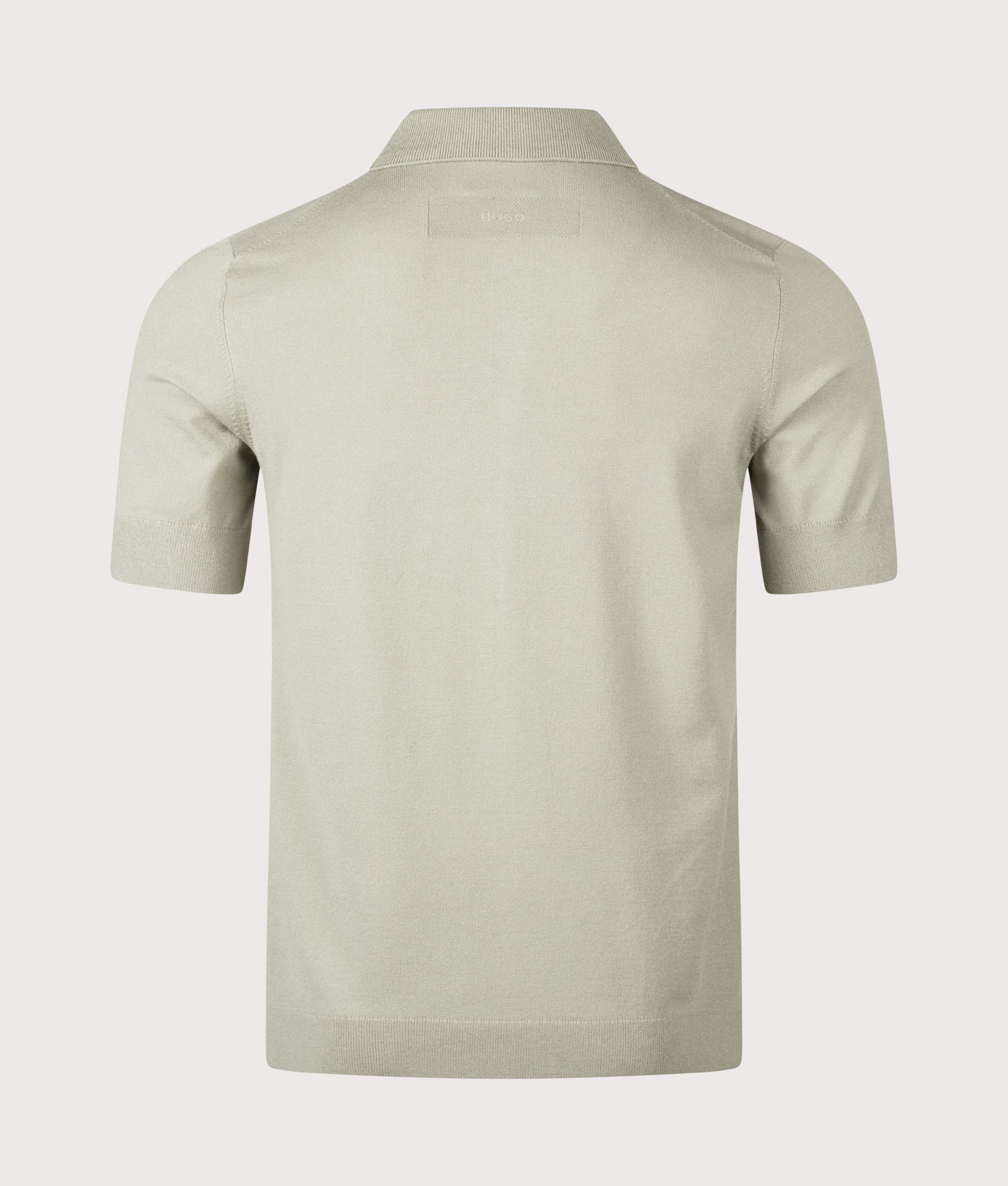 HUGO San Paco Short Sleeve Knitted Shirt in Light/Pastel Green at EQVVS Menswear. Back shot.
