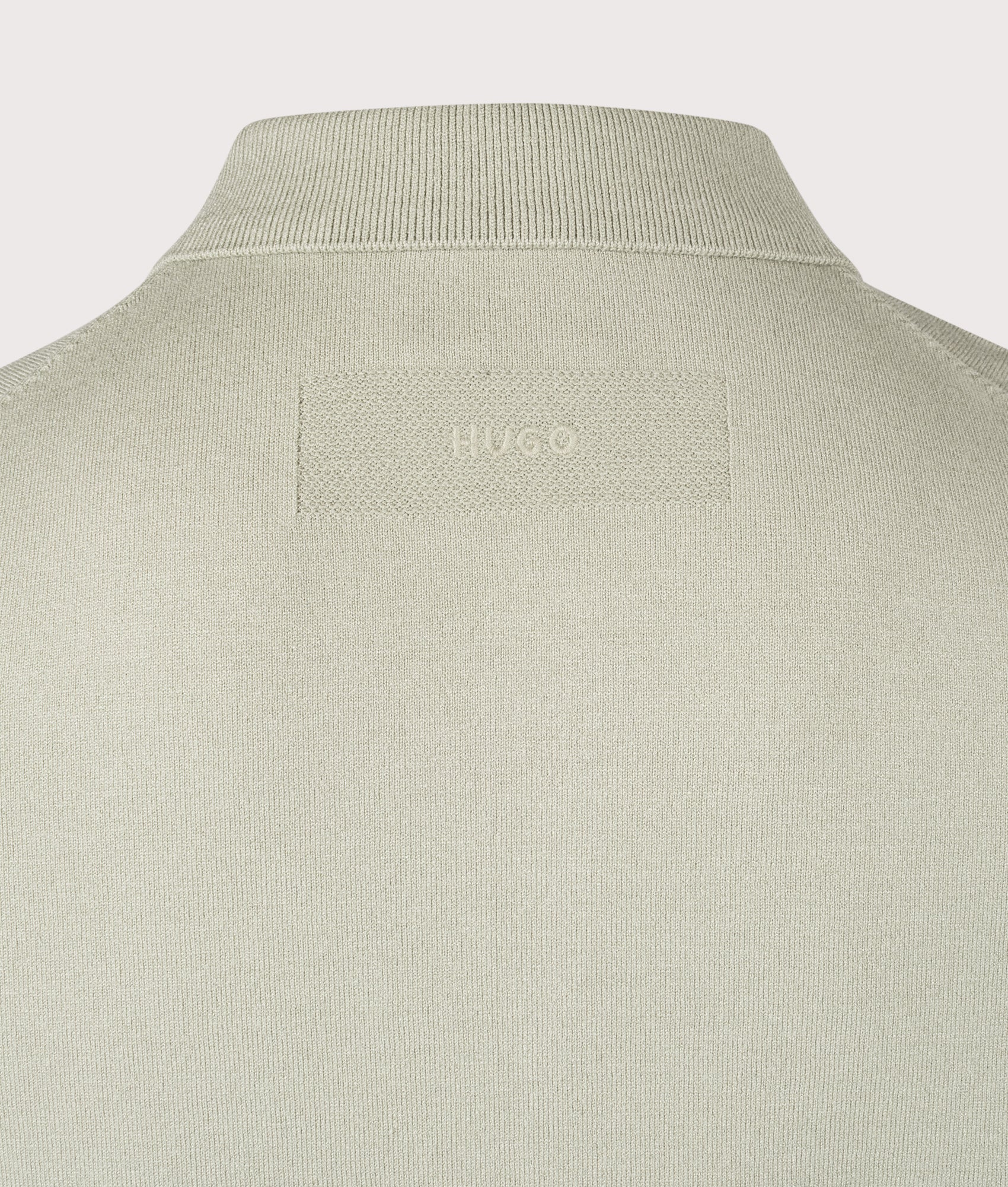 HUGO San Paco Short Sleeve Knitted Shirt in Light/Pastel Green at EQVVS Menswear. Detail shot.