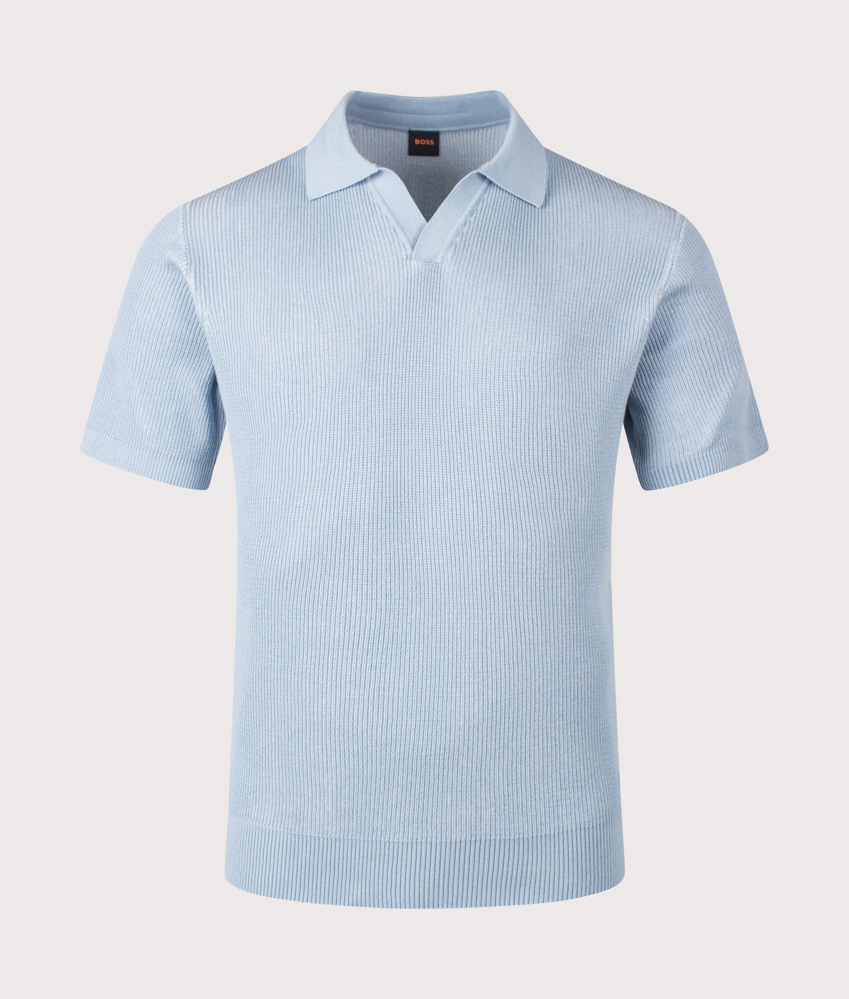 Aravolo Knit Polo Shirt in Light/Pastel Blue by BOSS. Shot by EQVVS. Front  shot.
