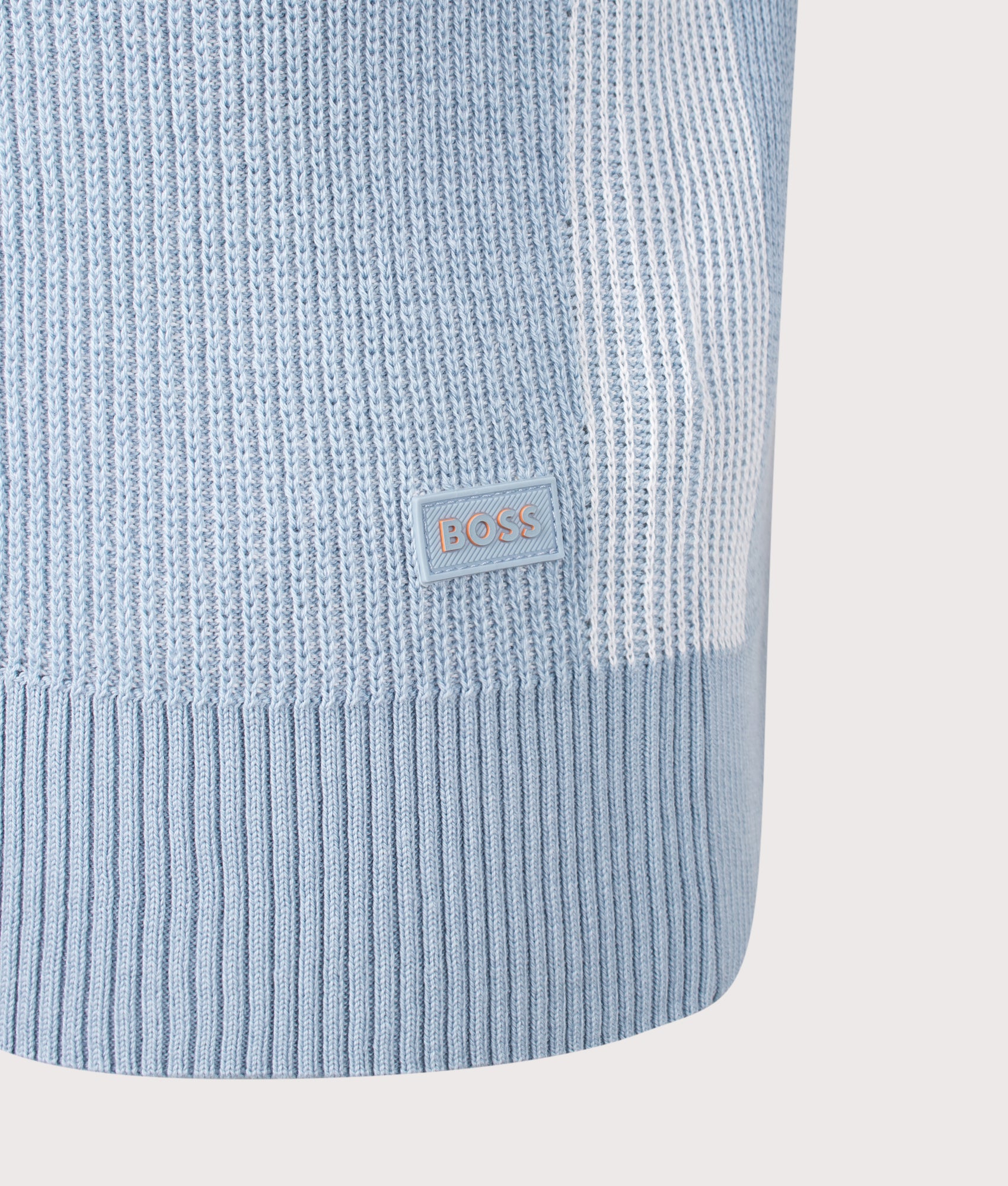 Aravolo Knit Polo Shirt in Light/Pastel Blue by BOSS. Shot by EQVVS .Detail shot.