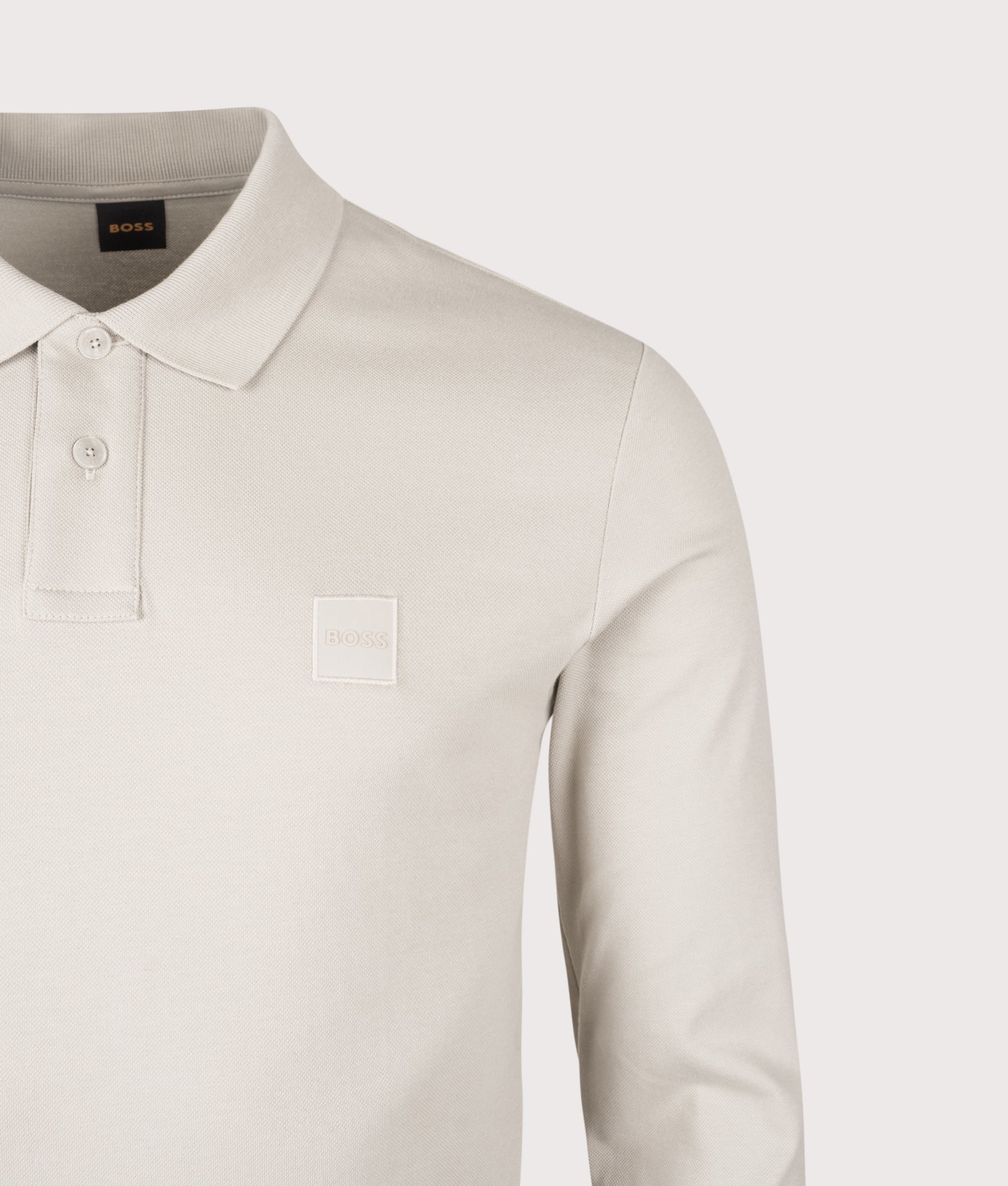BOSS Slim Fit Passerby Long Sleeve Polo Shirt in Open Grey at EQVVS Menswear. Detail shot.