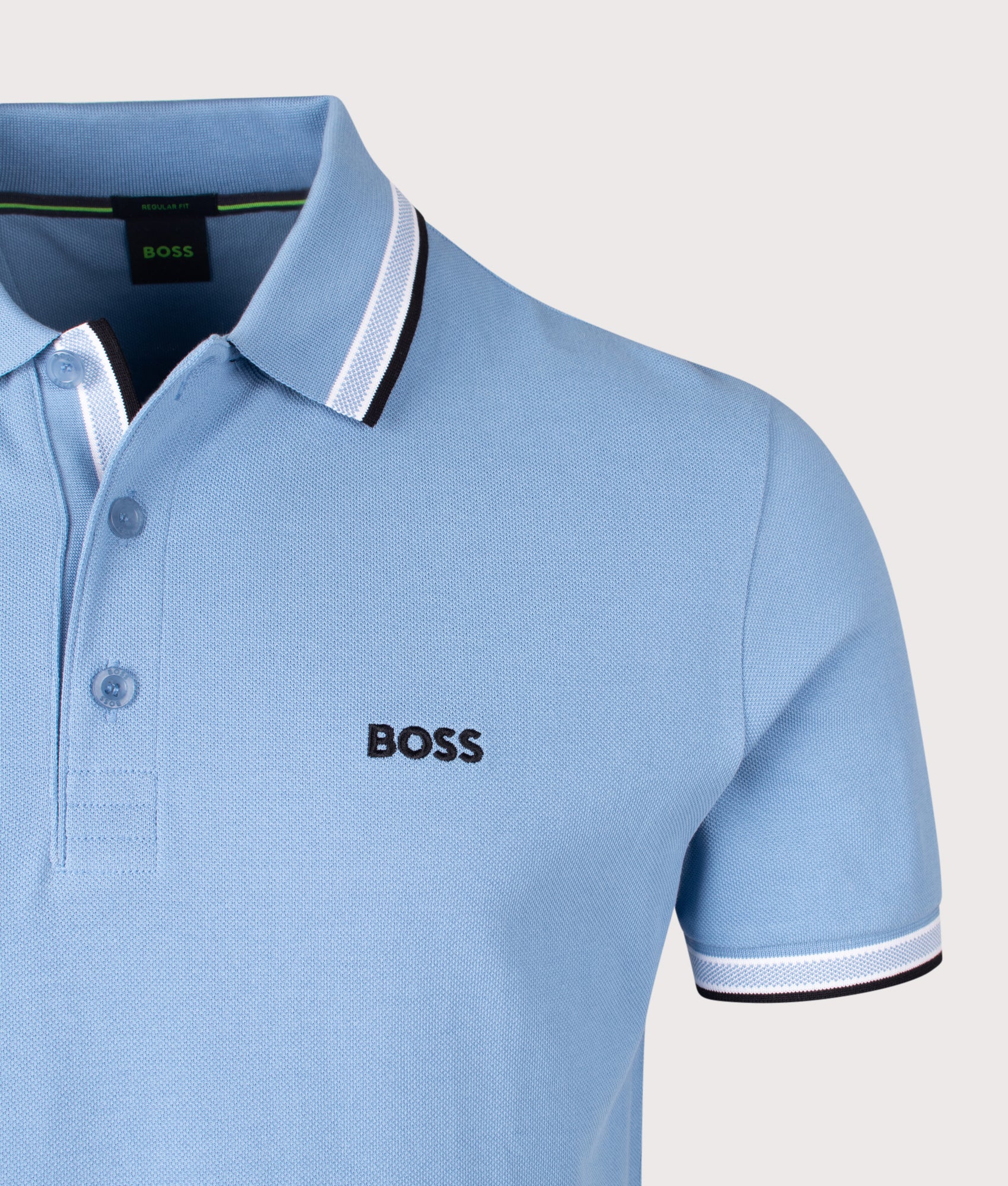 BOSS Paddy Polo Shirt in Open Blue at EQVVS Menswear. Detail shot.
