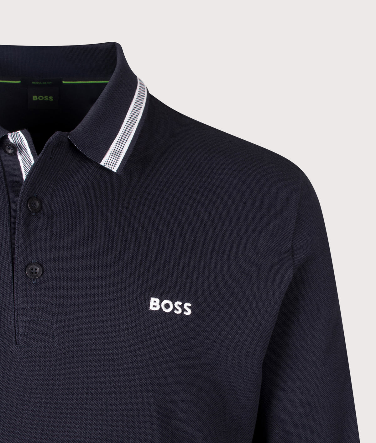 BOSS Regular Fit Plisy Long Sleeve Polo Shirt in Dark Blue at EQVVS Menswear. Detail shot.