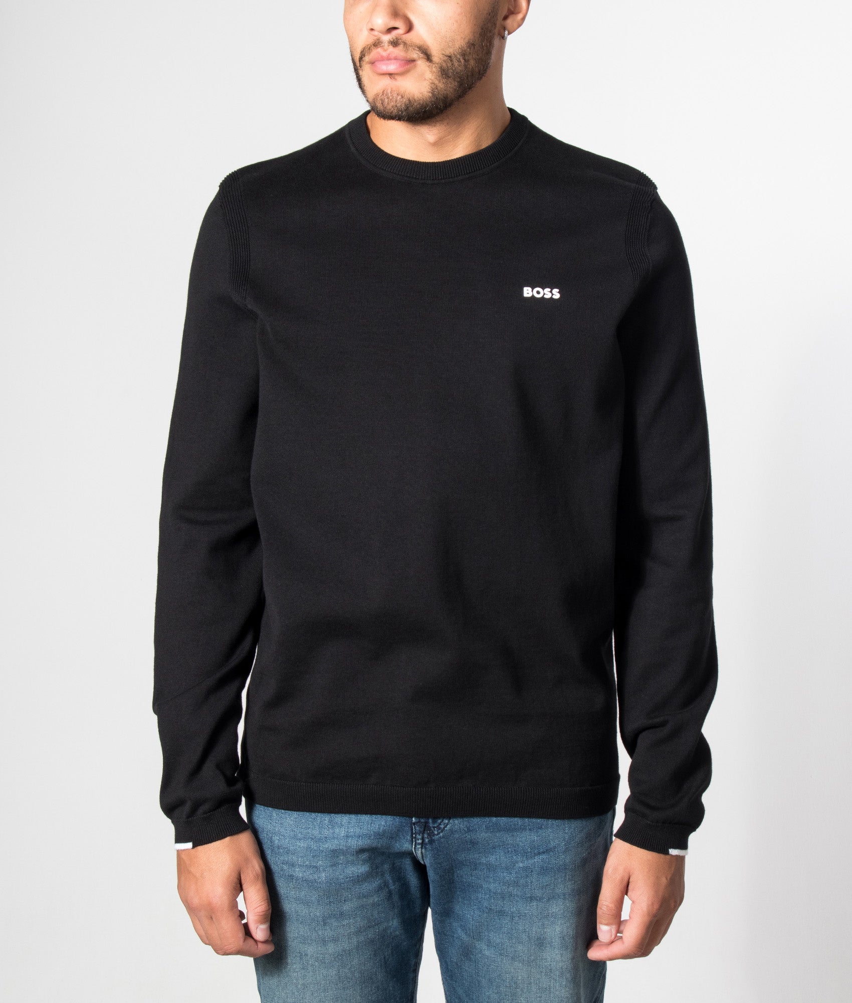 BOSS Regular Fit Ever-X Crew Neck Knitted Jumper in Black at EQVVS Menswear. Model front shot.
