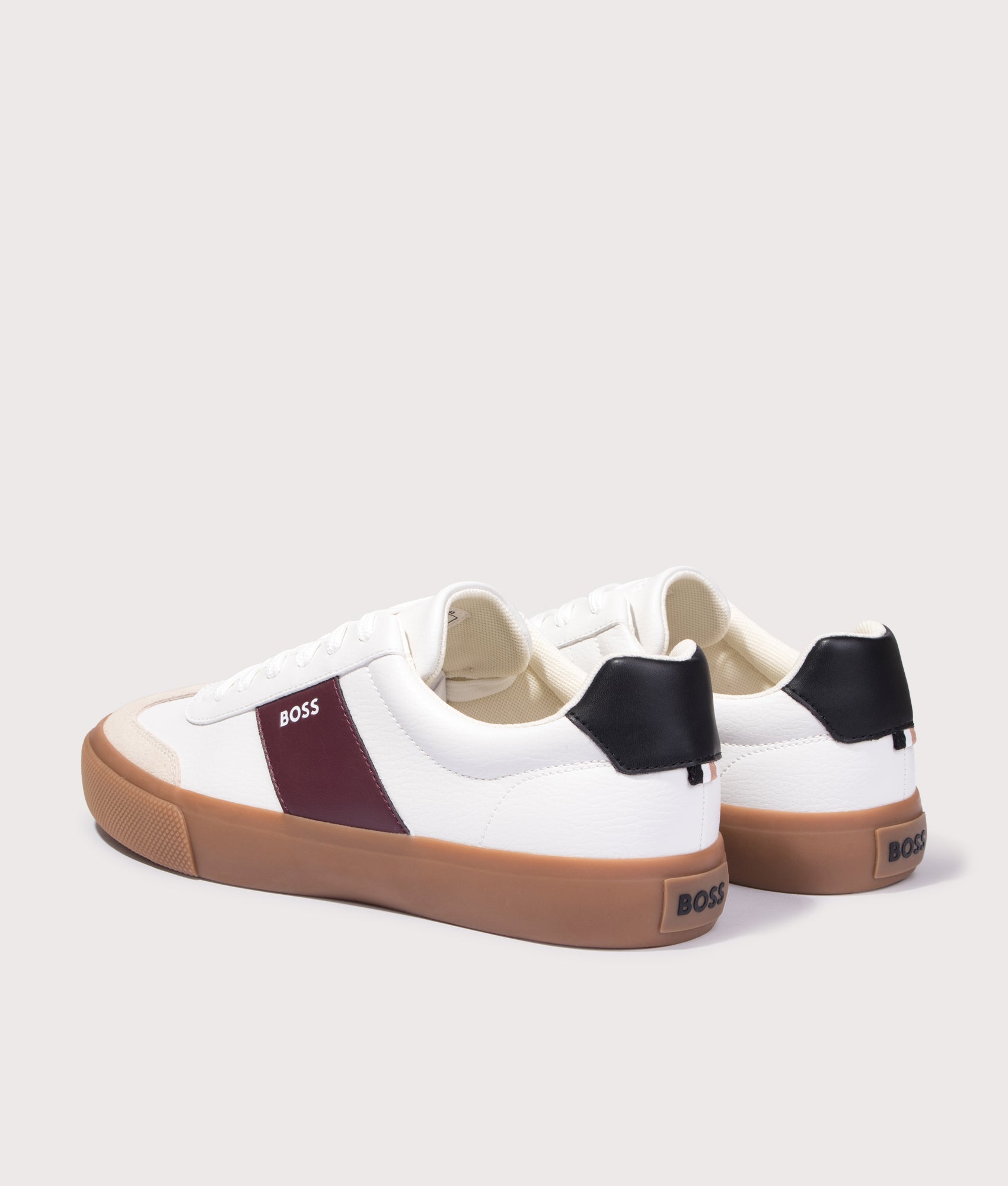BOSS Aiden Tenn Trainers in Open White at EQVVS Menswear. Angled back shot.