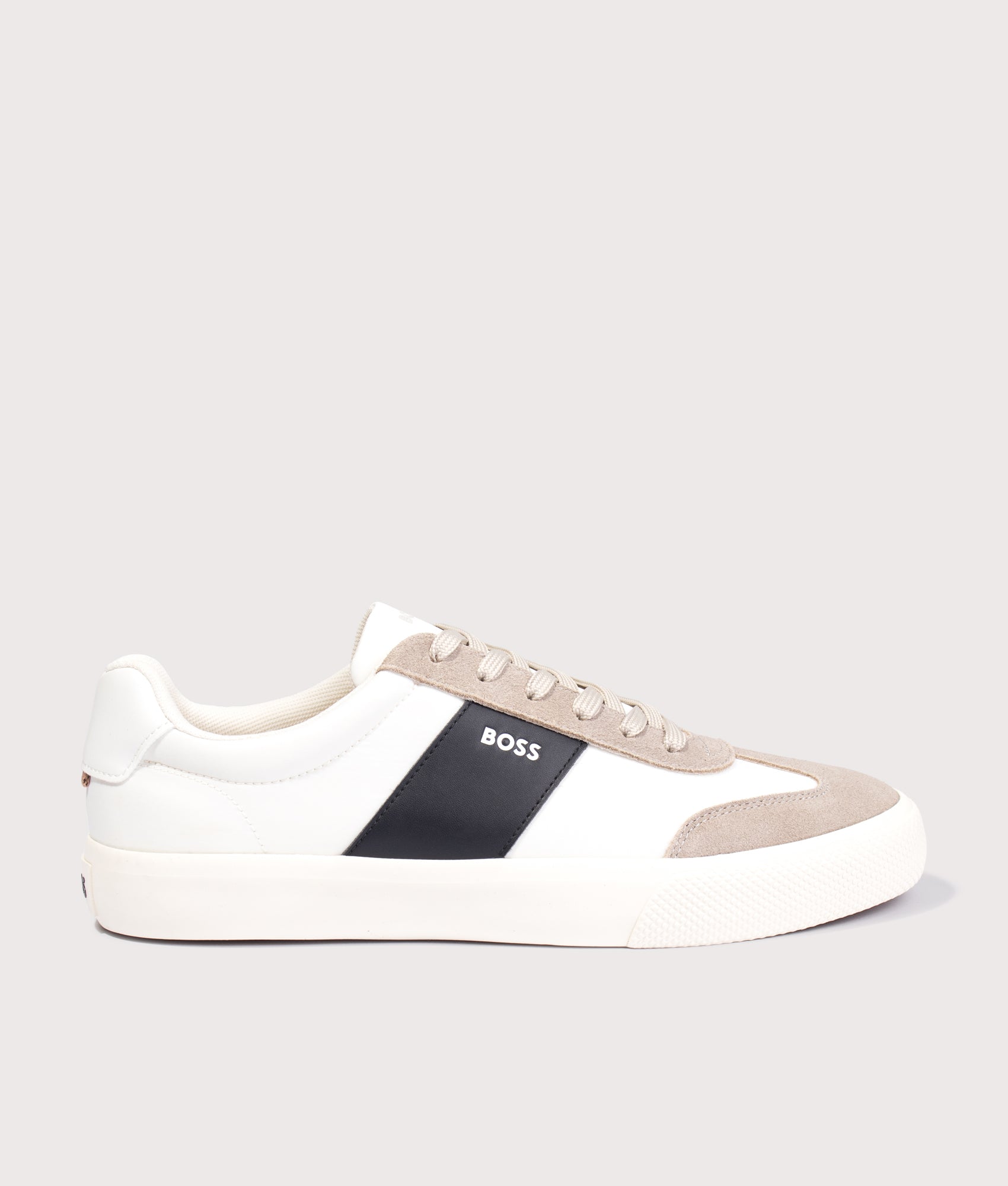 BOSS Aiden Tenn Trainers in Light Beige at EQVVS Menswear. Side shot.